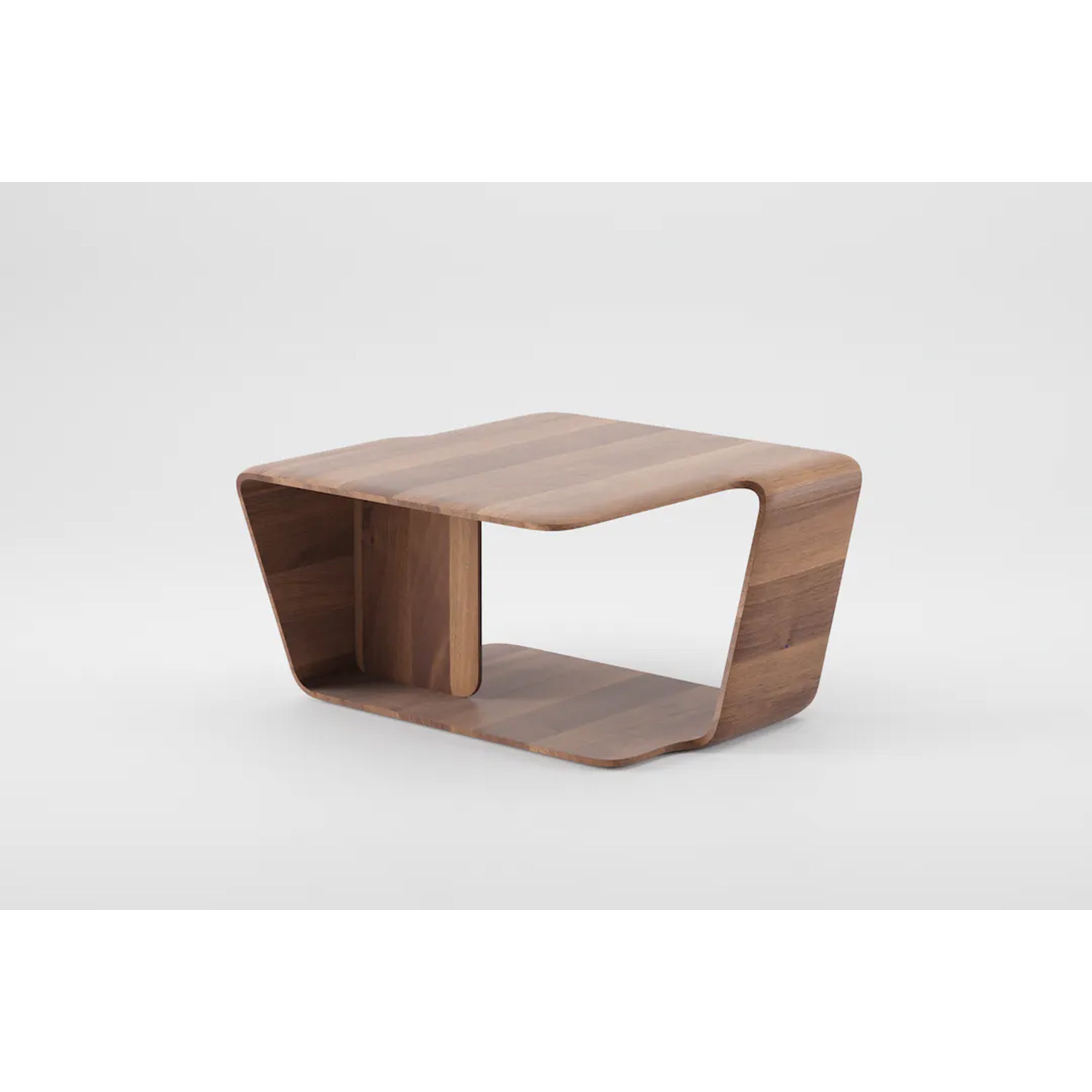 The Mars Coffee Table by Artisan is a modern, rectangular design made from solid wood with curved edges and open space below. Its natural wood grain finish is polished with eco-friendly oils for a sleek floor-hugging look without visible legs.