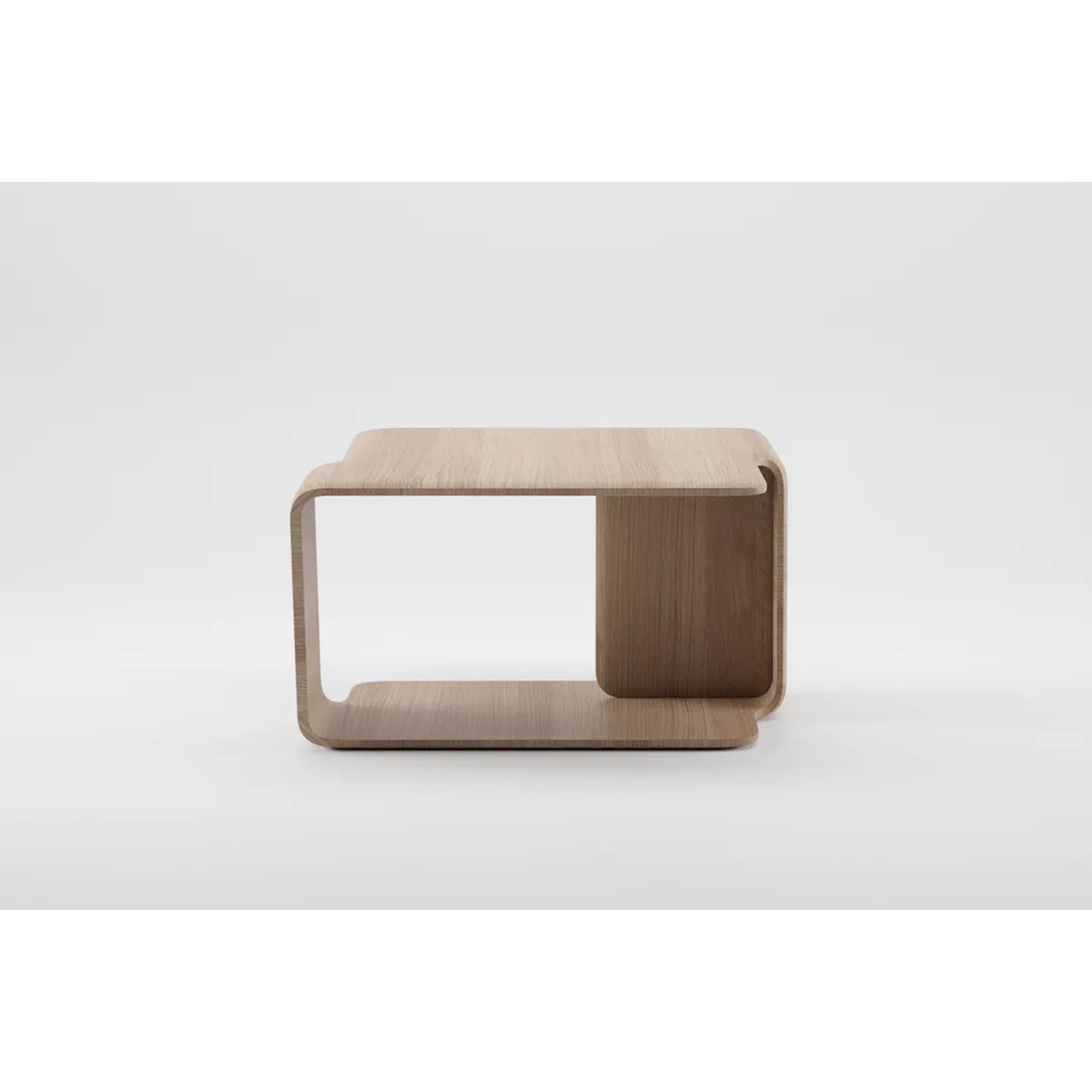 The Mars Coffee Table by Artisan is a minimalist wooden table with a rectangular, open design in light tones. Crafted from solid wood, it features smooth, curved edges and an asymmetric storage section. Finished with natural oils, it stands against a white background as an eco-friendly choice.