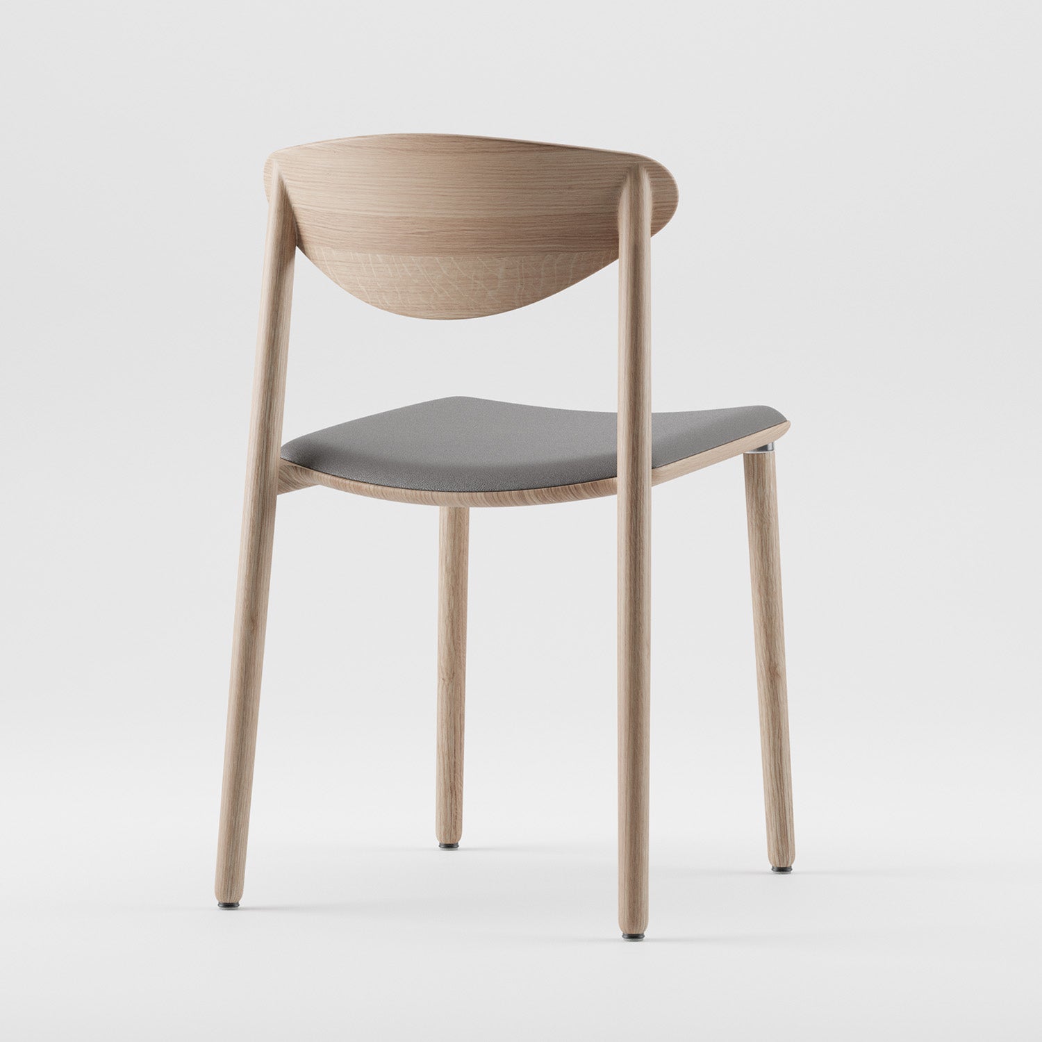 The NARU Chair Light by Artisan is a minimalist, eco-friendly modern chair featuring a light wood frame and a gray cushioned seat. Its design includes a curved backrest, four straight legs, and its shot against a plain white background.