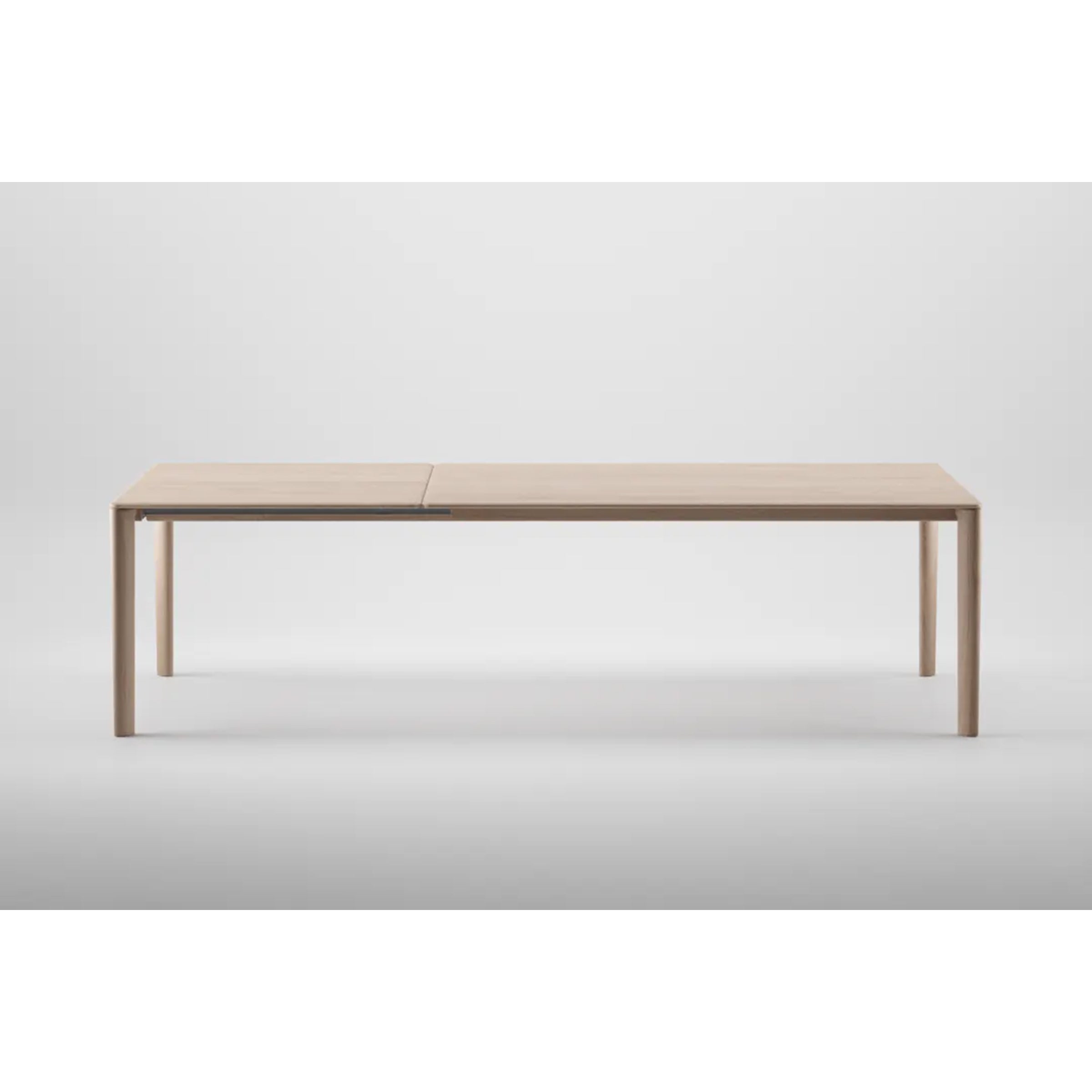 Meet the NEVA Table Extendable by Artisan: a minimalist design crafted from natural wood, featuring a light finish and sleek, straight legs, set against a plain white background.