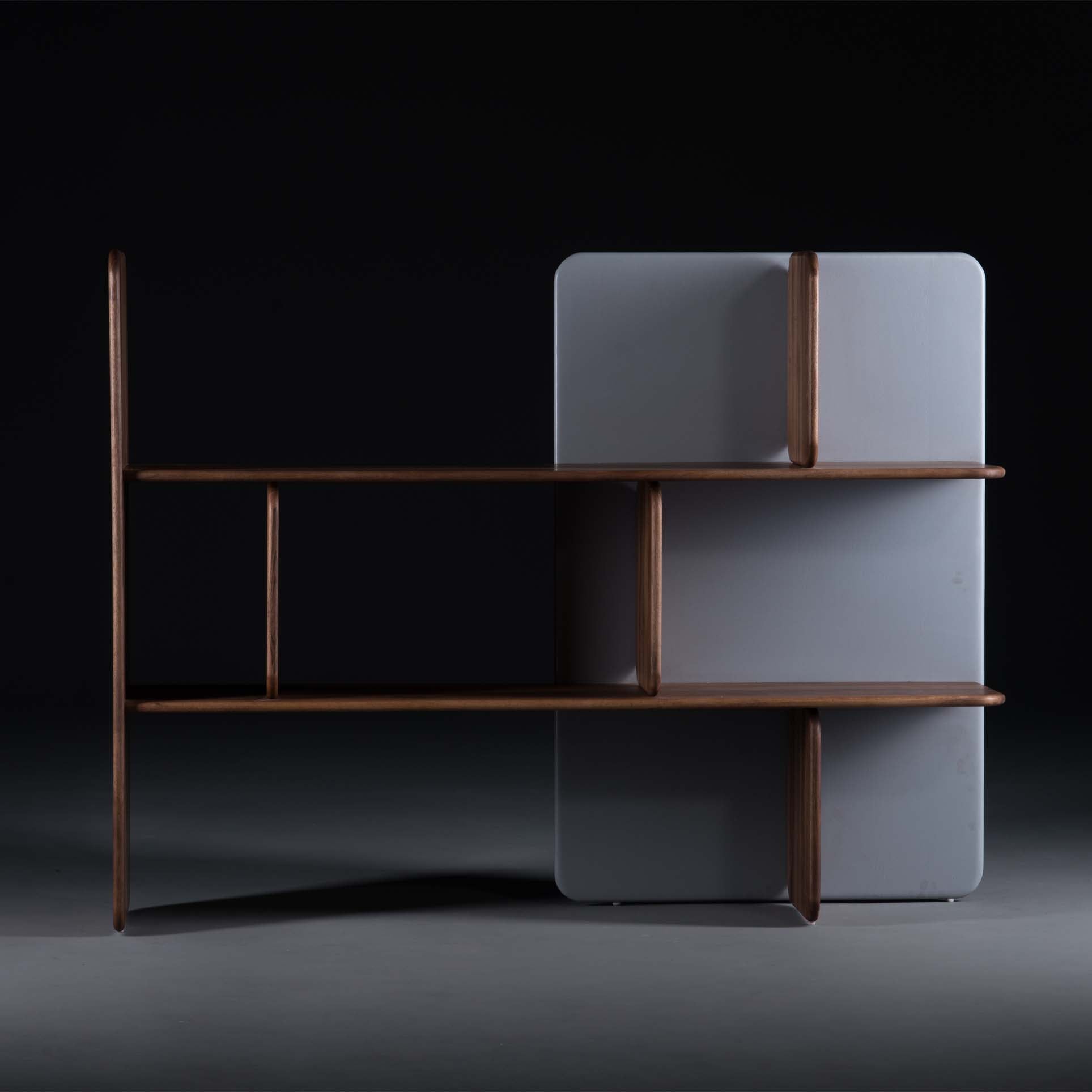 The SOFT Shelf - IVENTORY by Artisan is a modern, minimalist shelving unit with an eco-friendly dark wood frame and two wide shelves. It features a rectangular light gray support panel with natural finishes, set against a dark background in an asymmetrical design.