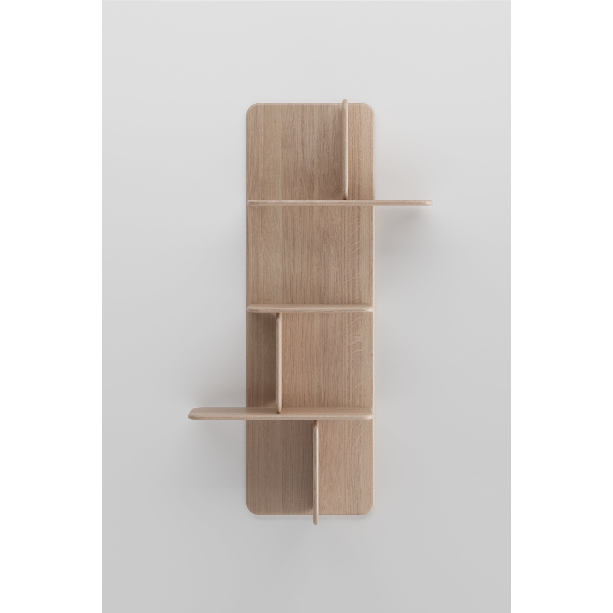 The Artisan Soft Wall Modules are chic wooden wall-mounted shelves with a minimalist design that showcases the elegance of organic materials. Featuring vertically and horizontally arranged panels forming five sections, the natural beauty is highlighted against a plain white background.