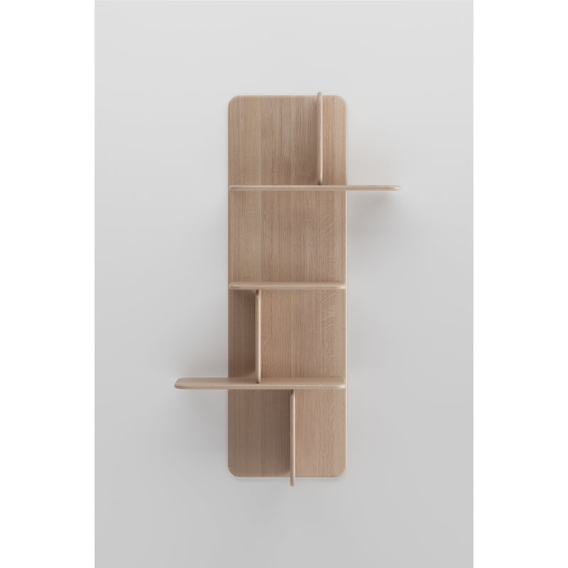 The Artisan Soft Wall Modules are chic wooden wall-mounted shelves with a minimalist design that showcases the elegance of organic materials. Featuring vertically and horizontally arranged panels forming five sections, the natural beauty is highlighted against a plain white background.