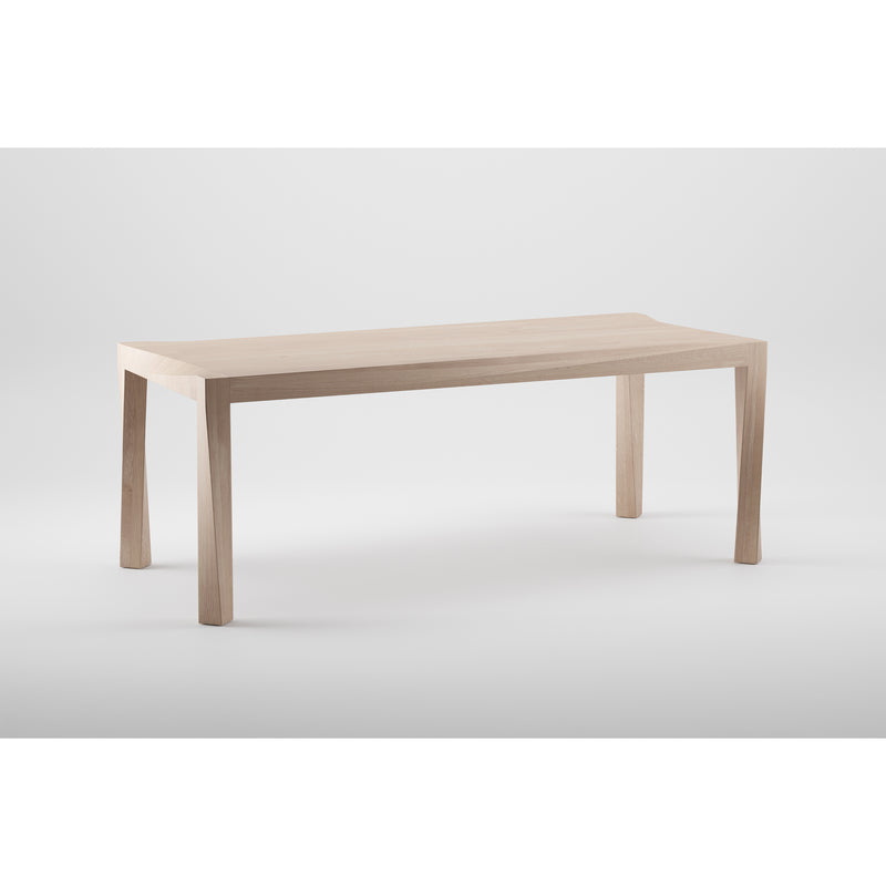 The TORSIO Table by Artisan is a minimalist piece with a smooth, rectangular wooden top and four straight solid wood legs. Its light, natural finish is crafted from eco-friendly materials for a sleek, modern look set against a plain white background.