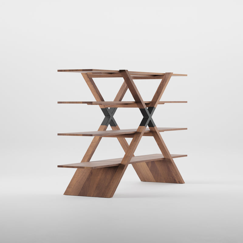 The X Shelf by Artisan is a modern wooden bookshelf made from solid wood, finished with natural oils. It has a unique zigzag design with four shelves supported by diagonal crossbeams, all set against a plain white background.