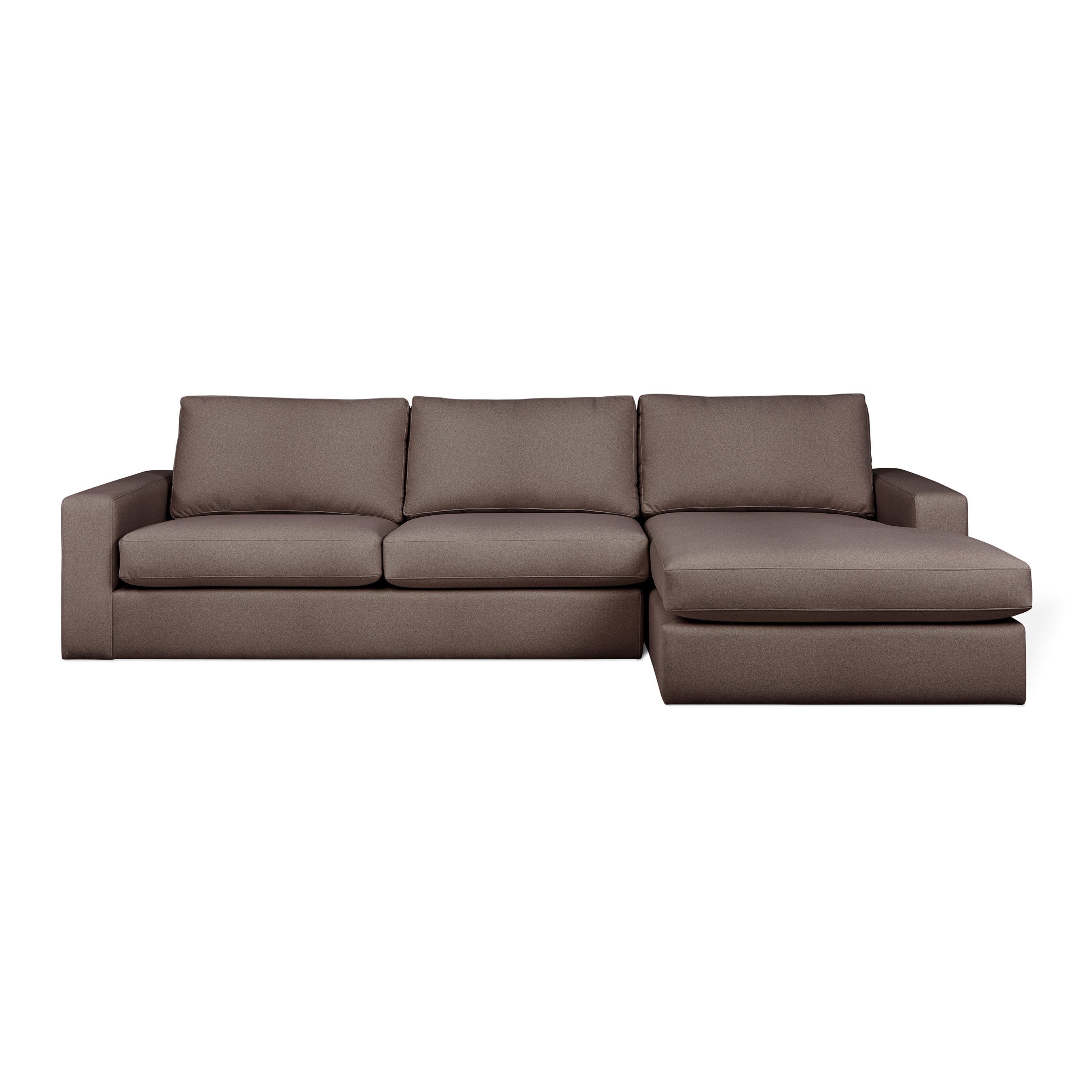 The Ashdale Right-Facing Sectional by Gus Modern features a hardwood frame, three seat and backrest cushions, a right-side chaise lounge, wide armrests, and plush synthetic-down cushions for modern minimalist comfort.