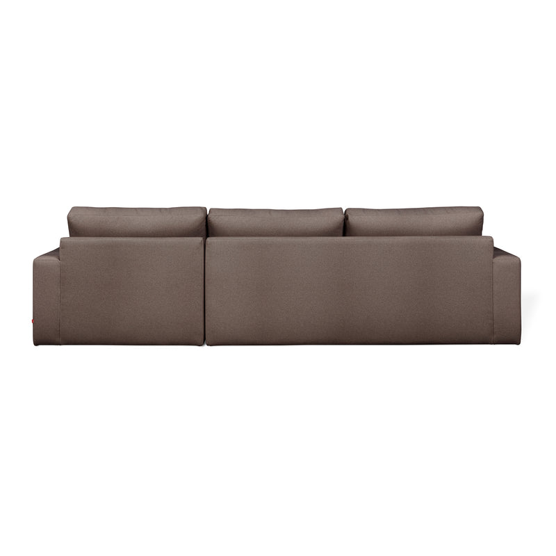 The Gus Modern Ashdale Right-Facing Sectional is a brown, three-seat minimalist sofa with a modern boxy design, straight lines, plush synthetic-down cushions, and a sturdy hardwood frame, shown from the back against a white background.