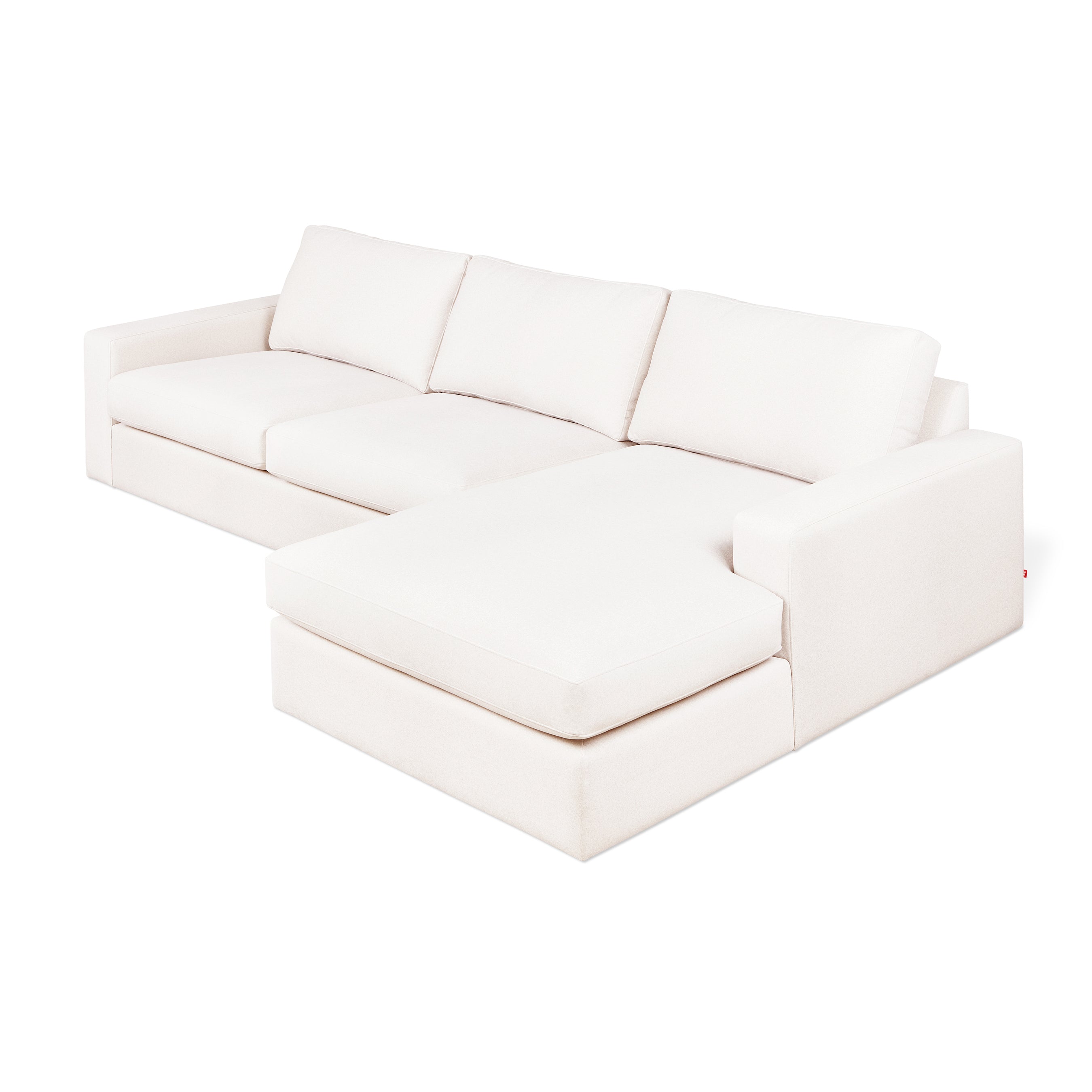 The Ashdale Right-Facing Sectional by Gus Modern features a hardwood frame, three seat and back cushions, an extended right chaise, clean lines, wide armrests, and synthetic-down cushions for modern minimalist comfort.