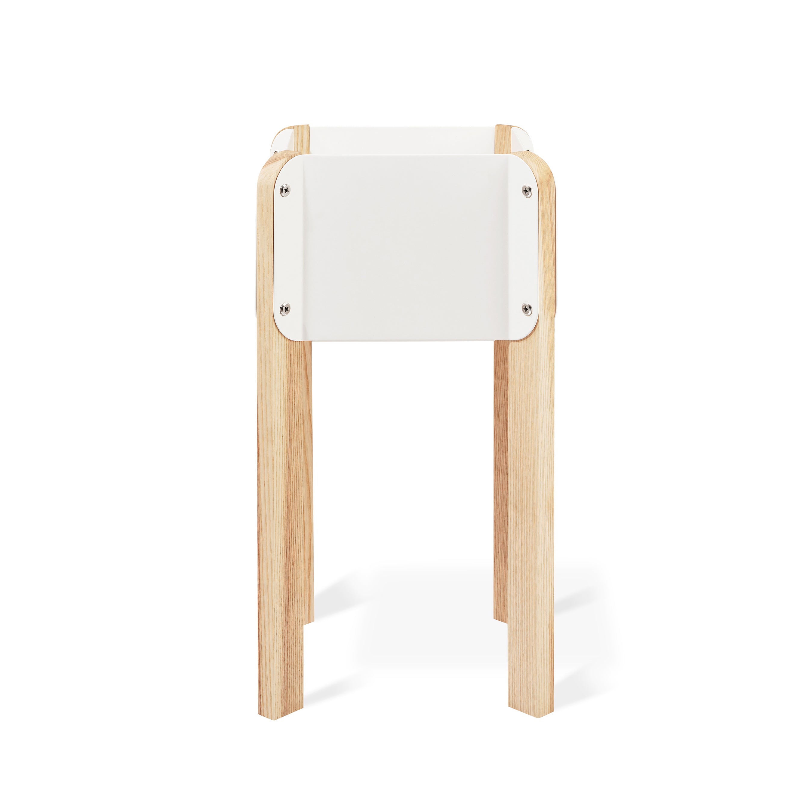 The Atrium Planter Hi by Gus Modern is a Bauhaus-inspired white rectangular planter with four light wooden legs, shown against a plain white background.