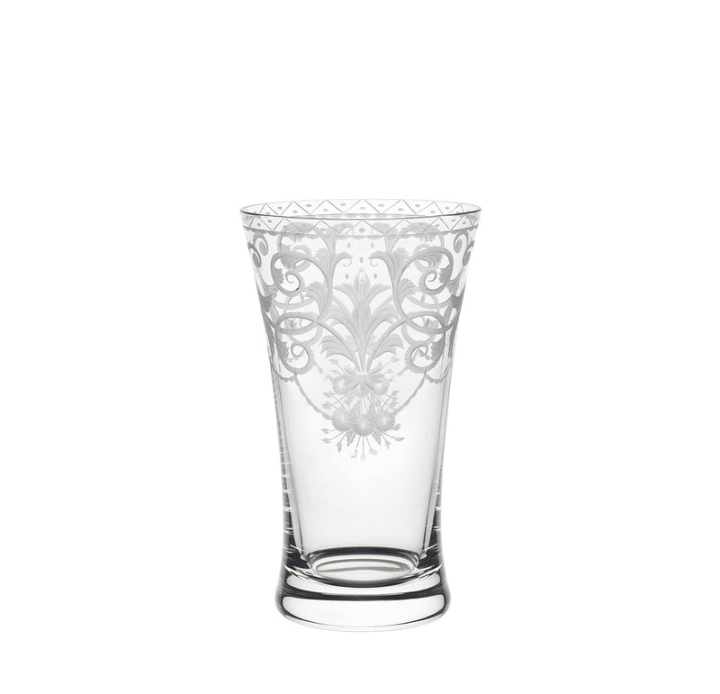 The Lobmeyr Drinking Set No. 231 - Barock boasts exquisite engravings reminiscent of Viennese Baroque glass, featuring intricate floral designs and geometric patterns near the rim, with a slightly tapered design and thick base that elegantly mirror mouth-blown, lead-free crystal craftsmanship.