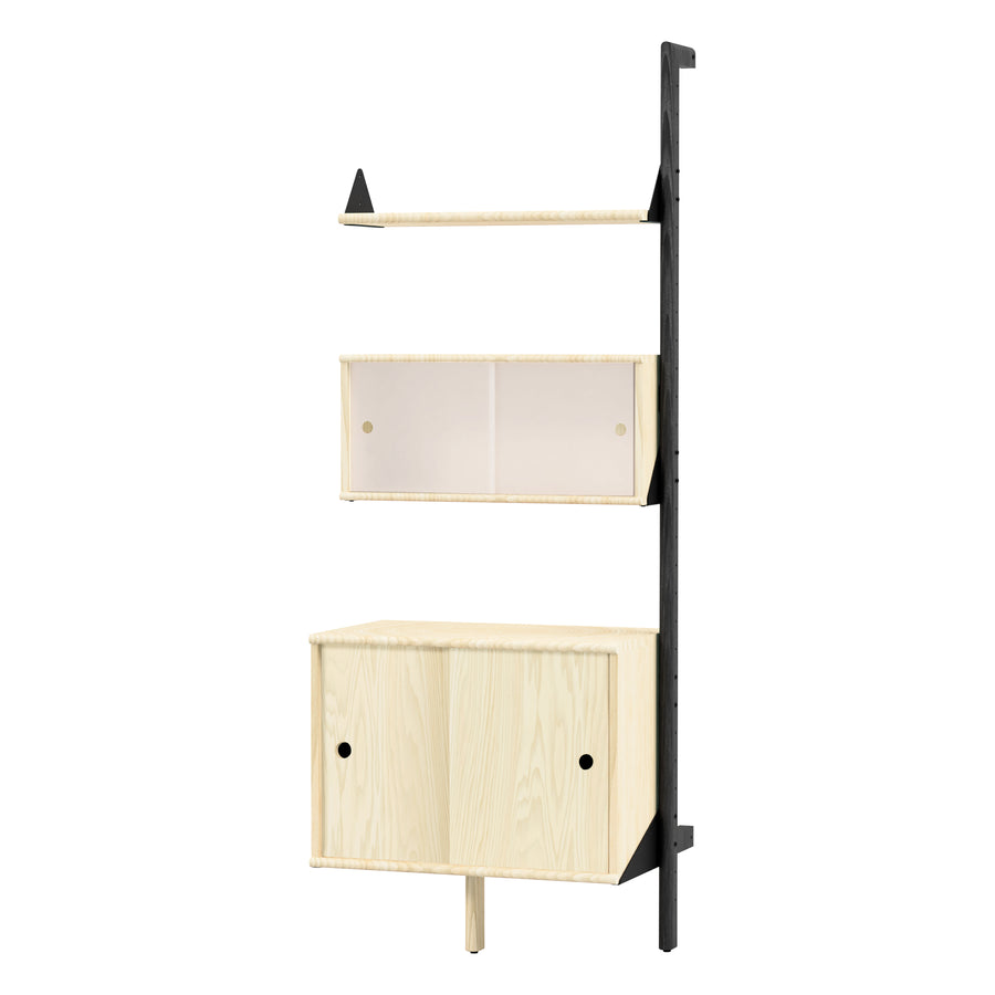 The Gus Modern Branch Multi Storage Unit Add-On is a modern, wall-mounted shelving unit with black frame and light wood shelves, featuring three compartments: an open shelf, a middle shelf with frosted sliding doors, and a bottom cabinet.