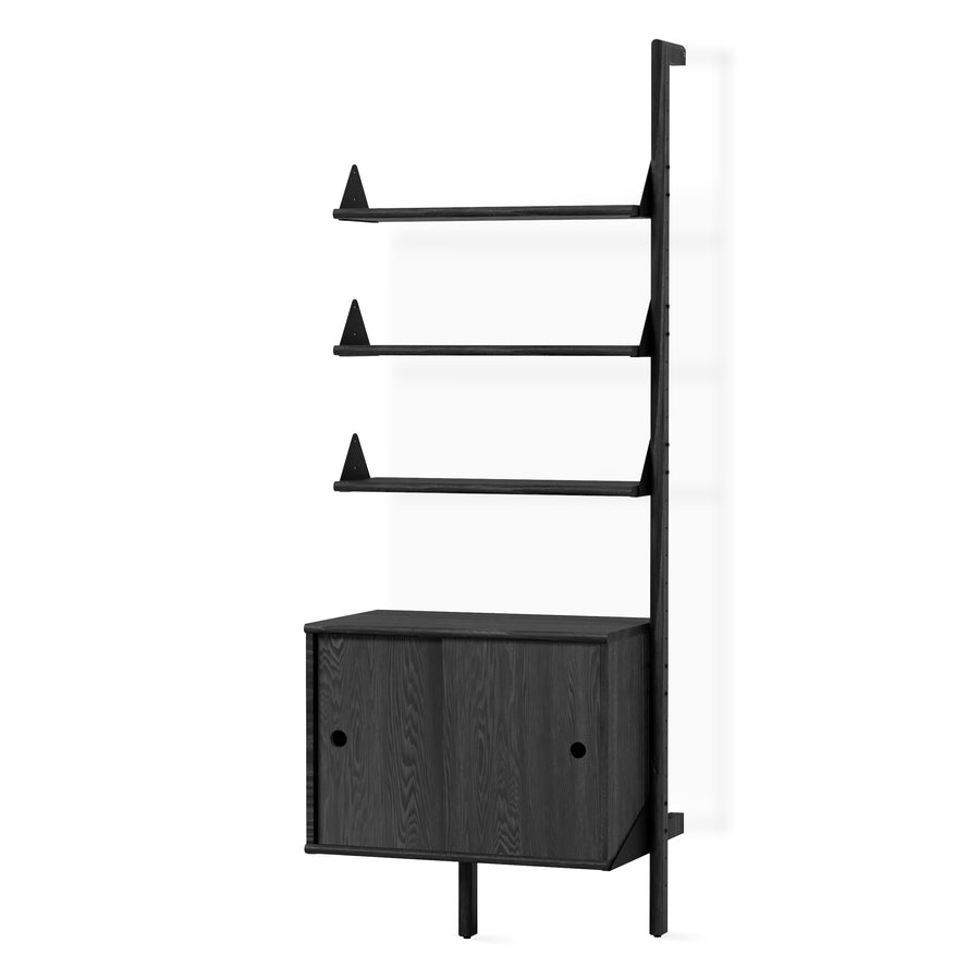 The Gus Modern Branch Storage Unit Add-On is a modern black shelving unit with three open shelves above a two-door cabinet, supported by a vertical frame. This minimalist, freestanding storage offers sleek, adaptable organization for any space.