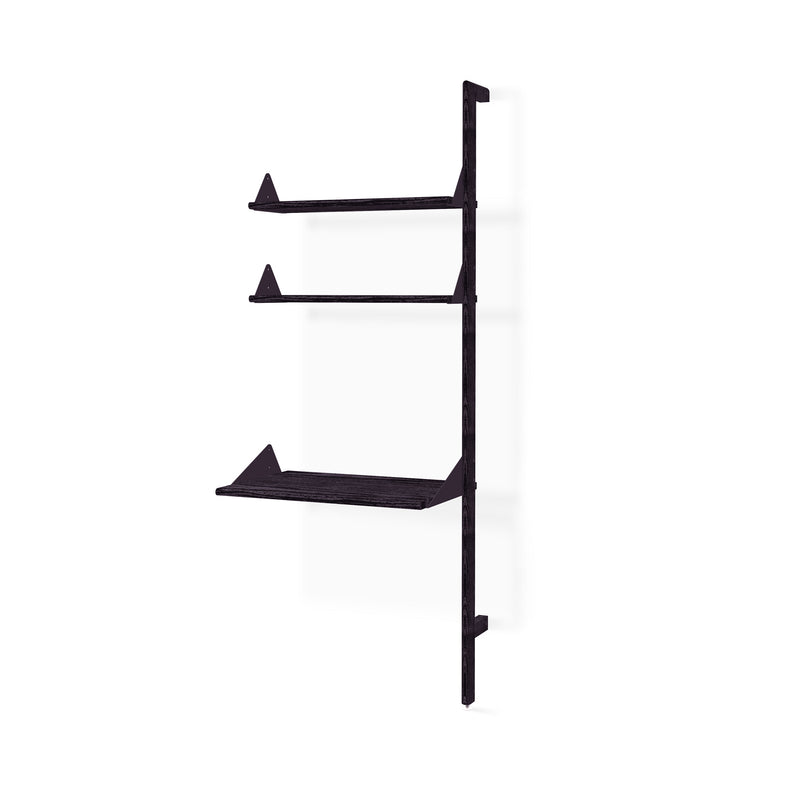 The Gus Modern Branch Desk Shelving Unit Add-On is a minimalist black wall-mounted unit with three staggered rectangular shelves and triangular supports, shown against a plain white background.