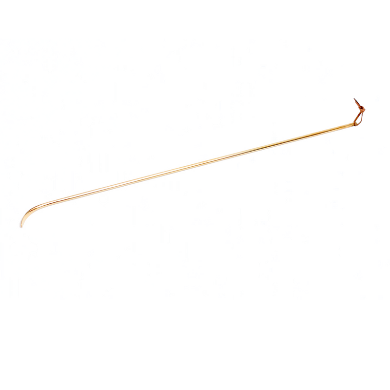 A long, thin metal rod with a slightly curved end and a small loop at the opposite end set against a white backdrop evokes the refined elegance of Werkstätte Carl Auböck’s Shoehorn #4226.