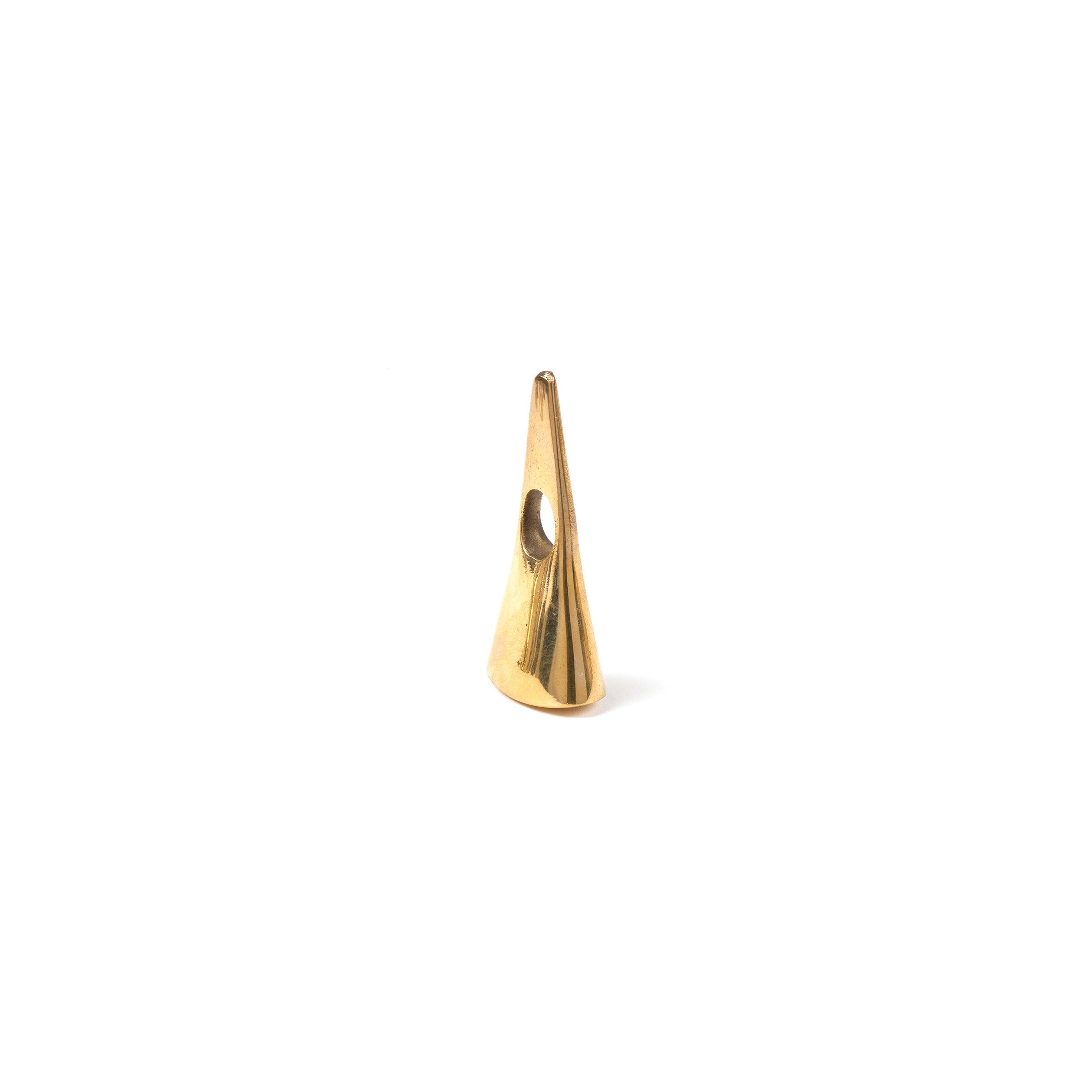 Snuffer #3513 by Werkstätte Carl Auböck is a small, smooth, cone-shaped brass-polished object with a hole near the top. It stands vertically against a plain white background, reminiscent of Carl Auböck design or Wiener Bronzen.