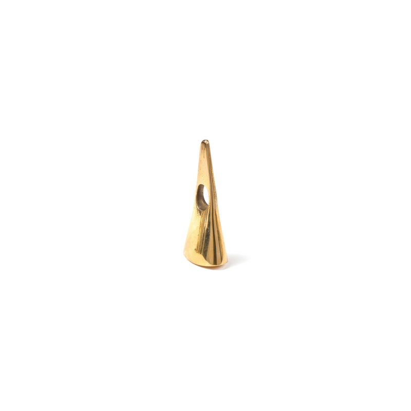 Snuffer #3513 by Werkstätte Carl Auböck is a small, smooth, cone-shaped brass-polished object with a hole near the top. It stands vertically against a plain white background, reminiscent of Carl Auböck design or Wiener Bronzen.
