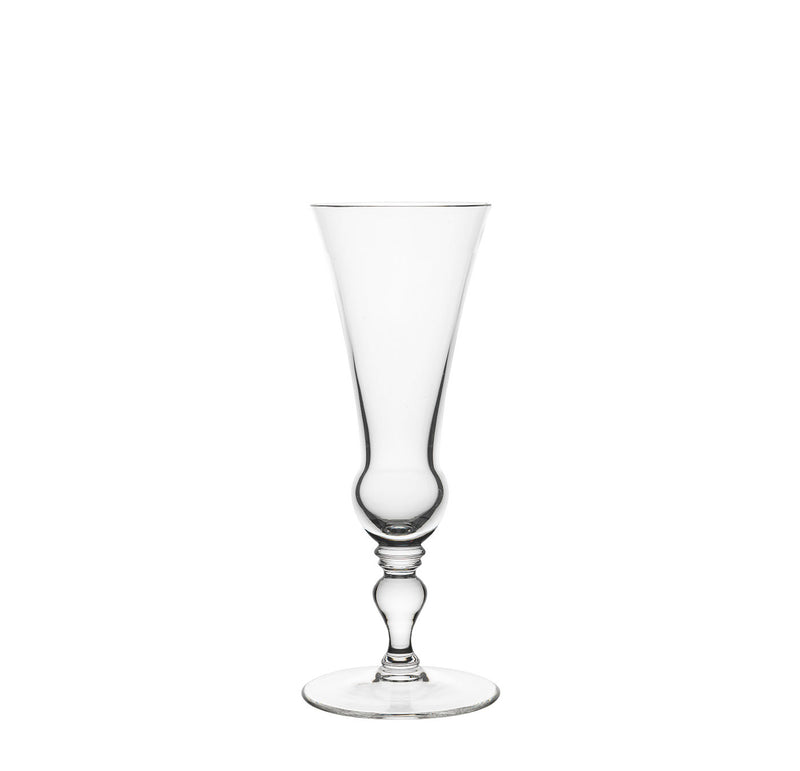 A tall, clear glass from Lobmeyrs Drinking Set No. 231 - Barock, featuring a decorative stem and flared top, elegantly showcases champagne or cocktails against a plain white background.