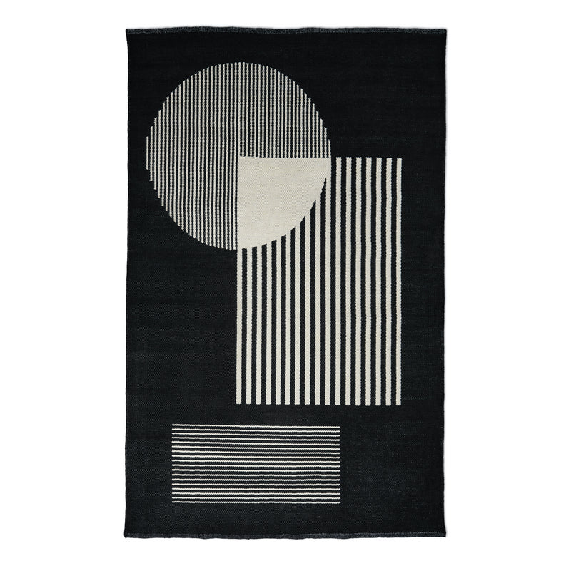 Black rug with cream geometric shapes including a vertically striped circle, vertically striped square, and horizontally striped rectangle