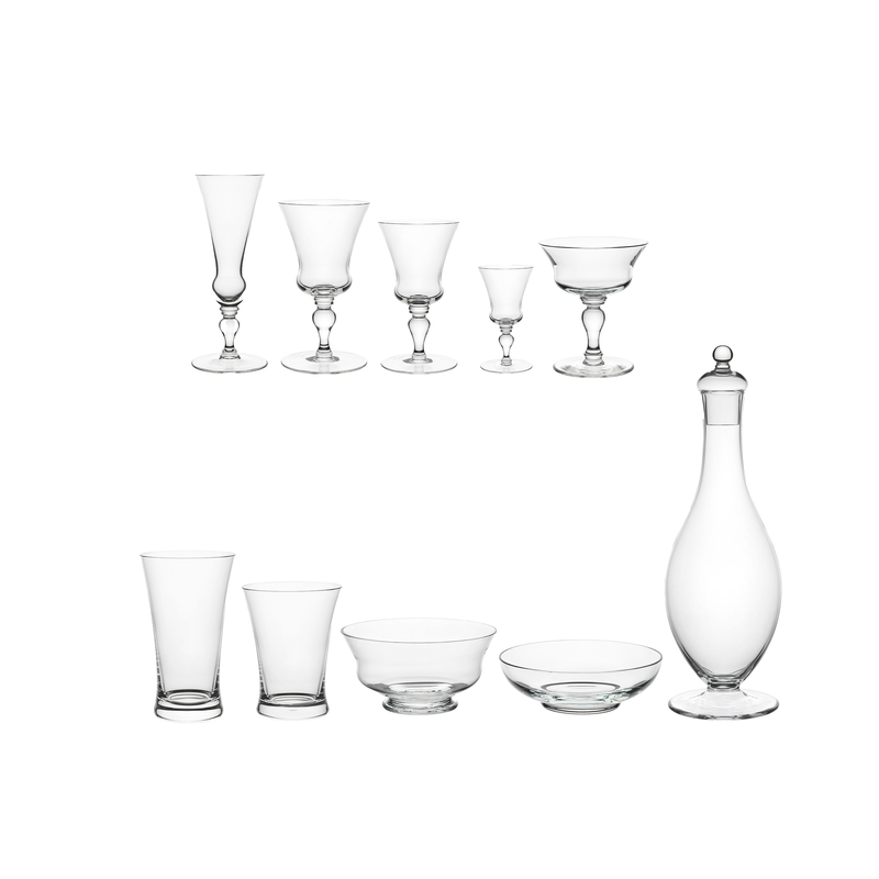 The Lobmeyr Drinking Set No. 231 - Barock includes clear glassware of timeless charm on a white background, featuring bowls, glasses, and a tall elegant decanter with stopper. Made from mouth-blown lead-free crystal, it beautifully showcases exquisite craftsmanship in each piece.
