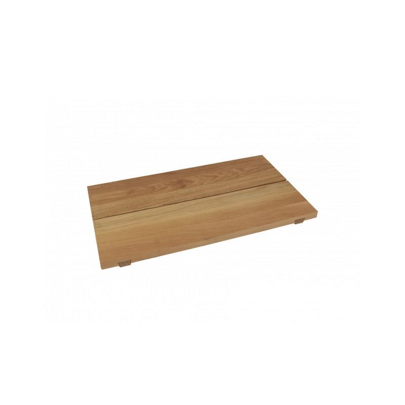 The EK06 Base by E15 is a rectangular wooden cutting board crafted from solid European oak, showcasing a beautiful wood grain pattern. Slightly elevated on small legs and set against a plain white background, it embodies traditional joinery and timeless elegance.