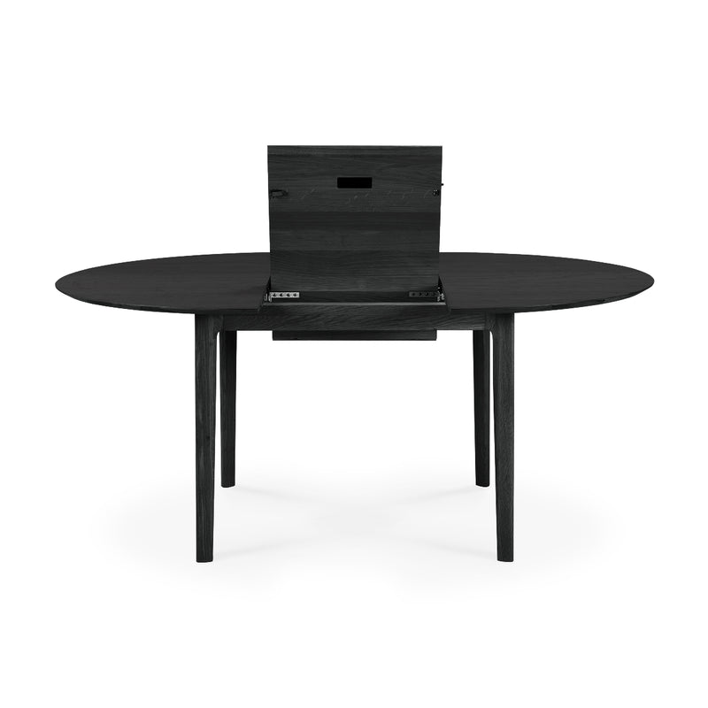 Bok Extendable Dining Table - Round in black oak with extendable feature and sleek modern design.