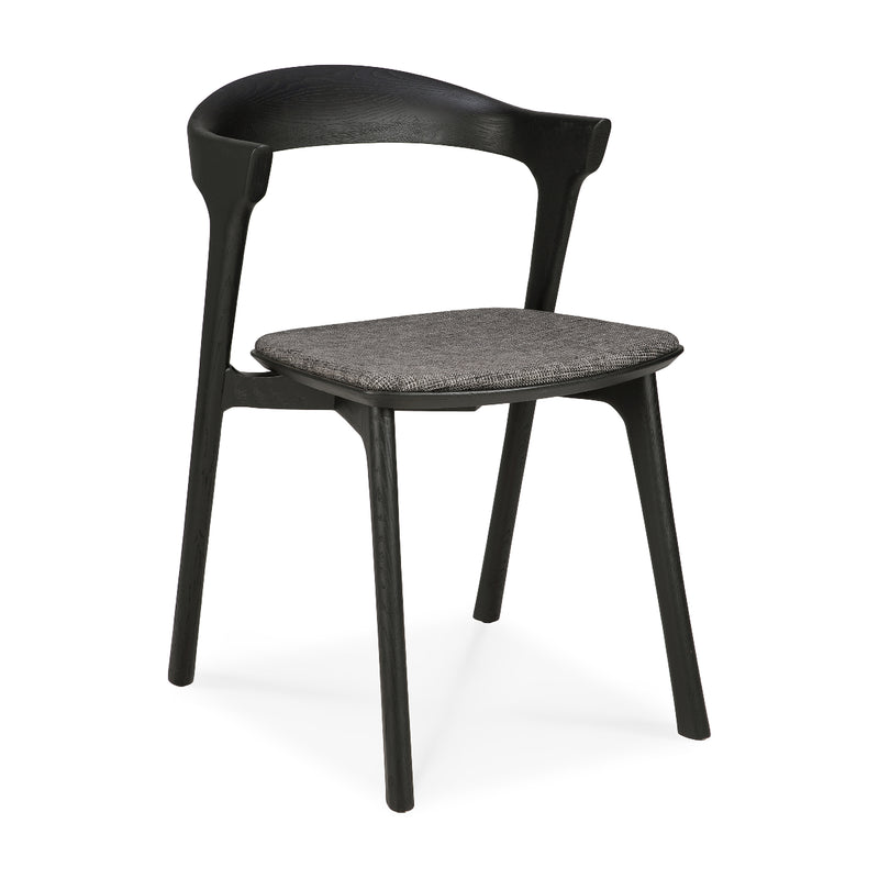 Bok Dining Chair Upholstered with dark grey cushioned seat and black varnished oak frame, modern ergonomic design.