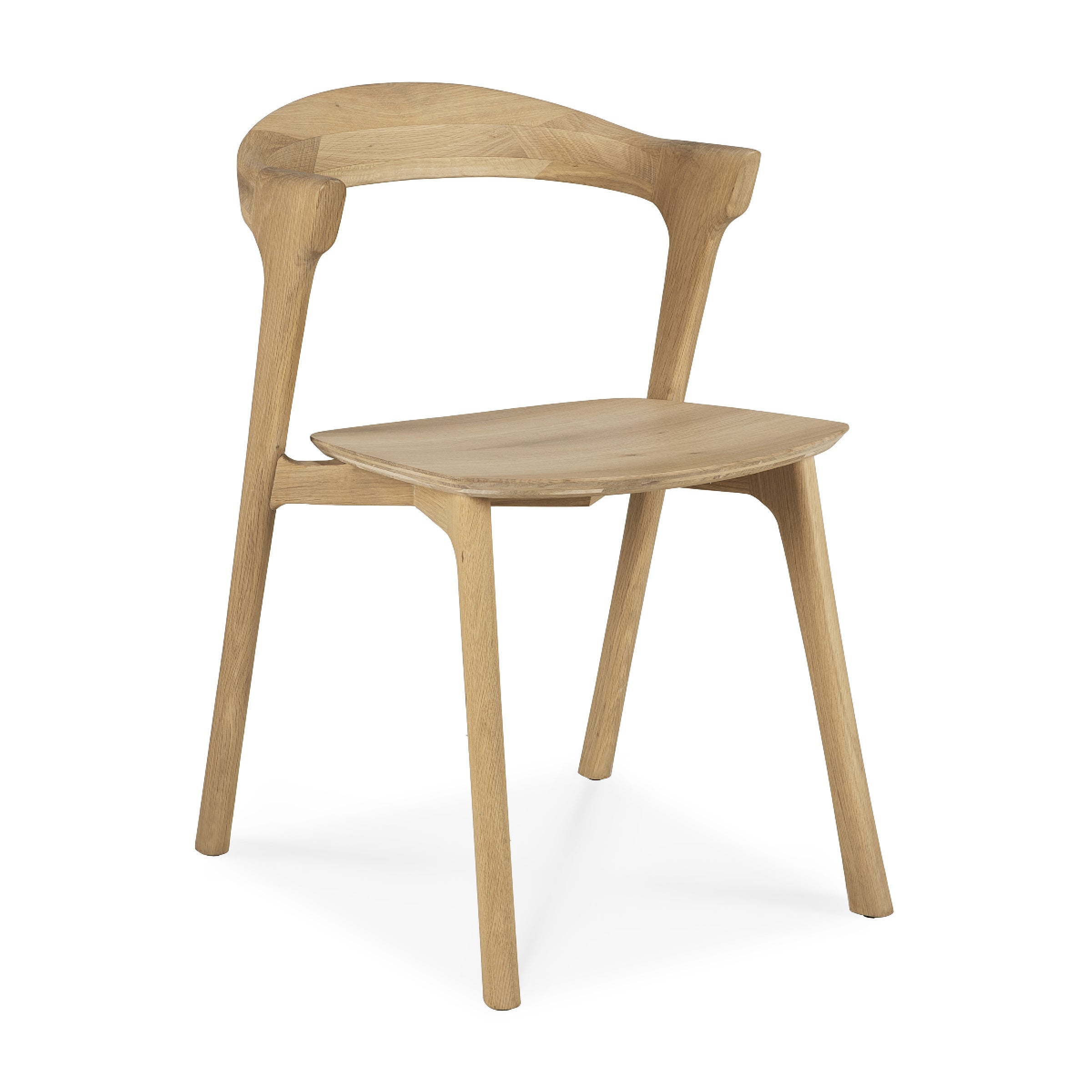 Bok Dining Chair made of varnished oak with ergonomic curved backrest and sleek modern design for dining rooms.