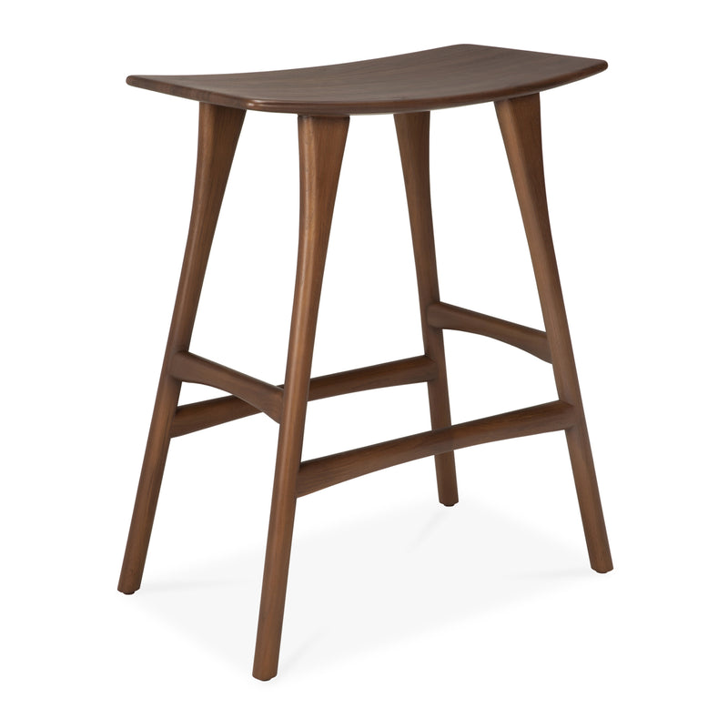 Osso Counter Stool in solid varnished teak with sleek curved seat and sturdy four-leg design against white background