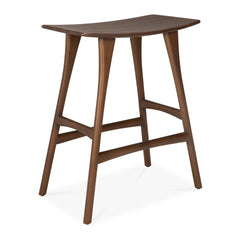 Osso Counter Stool in solid varnished teak with sleek curved seat and sturdy four-leg design against white background