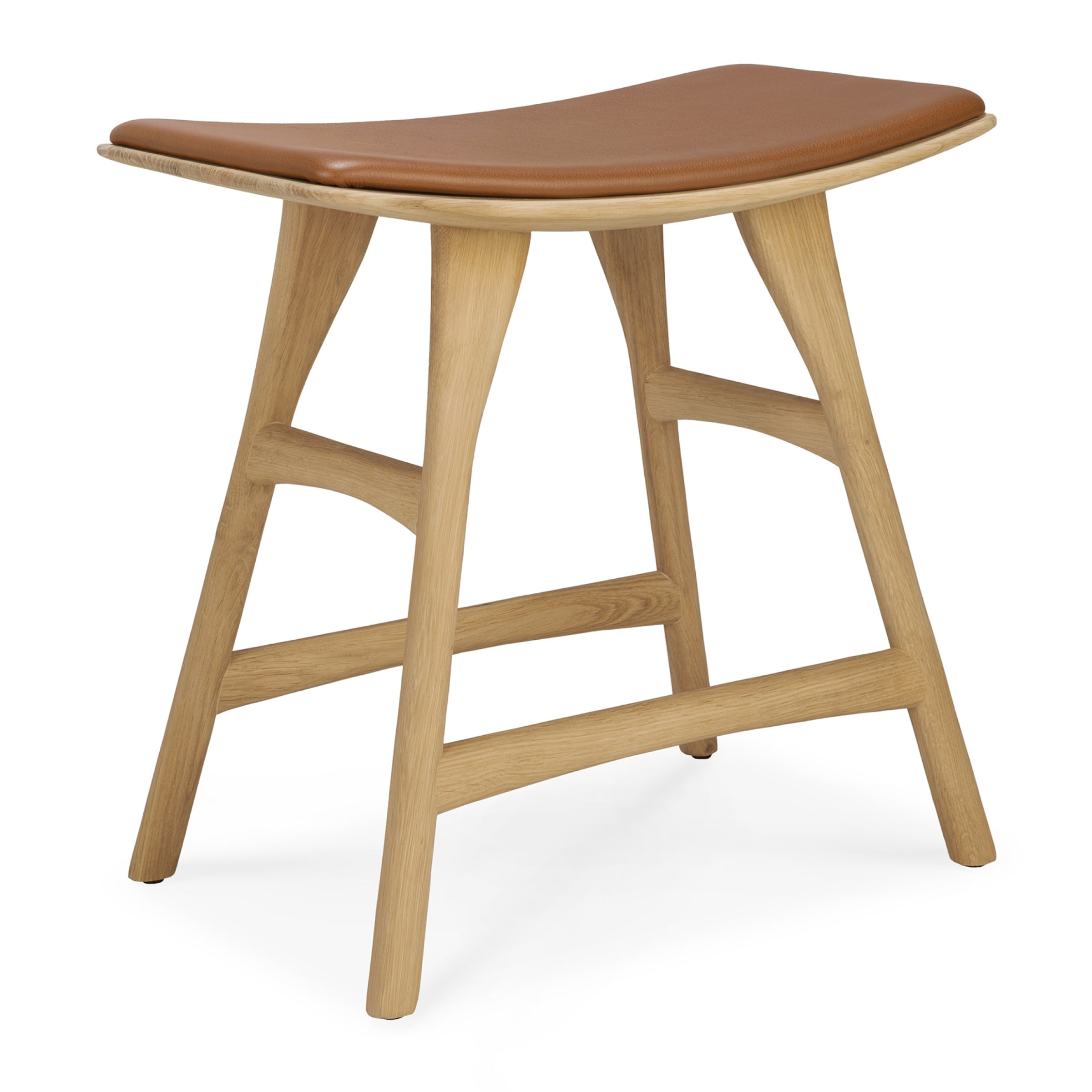 The Ethnicraft Osso Stool features angled legs, a light oak finish, and a curved brown leather seat—an elegant designer piece for any space.