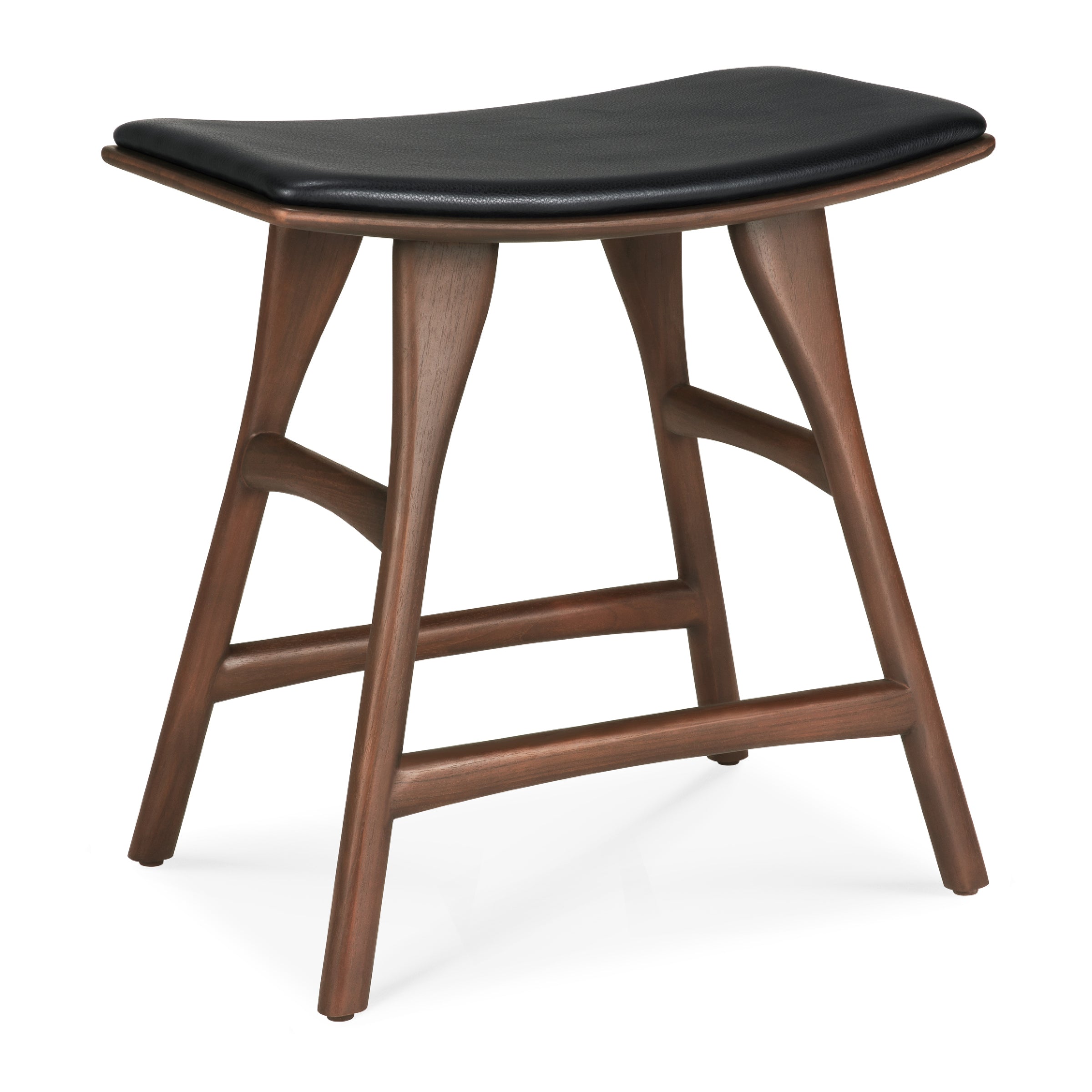 The Ethnicraft Osso Stool features a smooth, mid-century modern design with a curved black cushioned seat, angled legs, and is crafted from oak or teak for stylish designer seating.