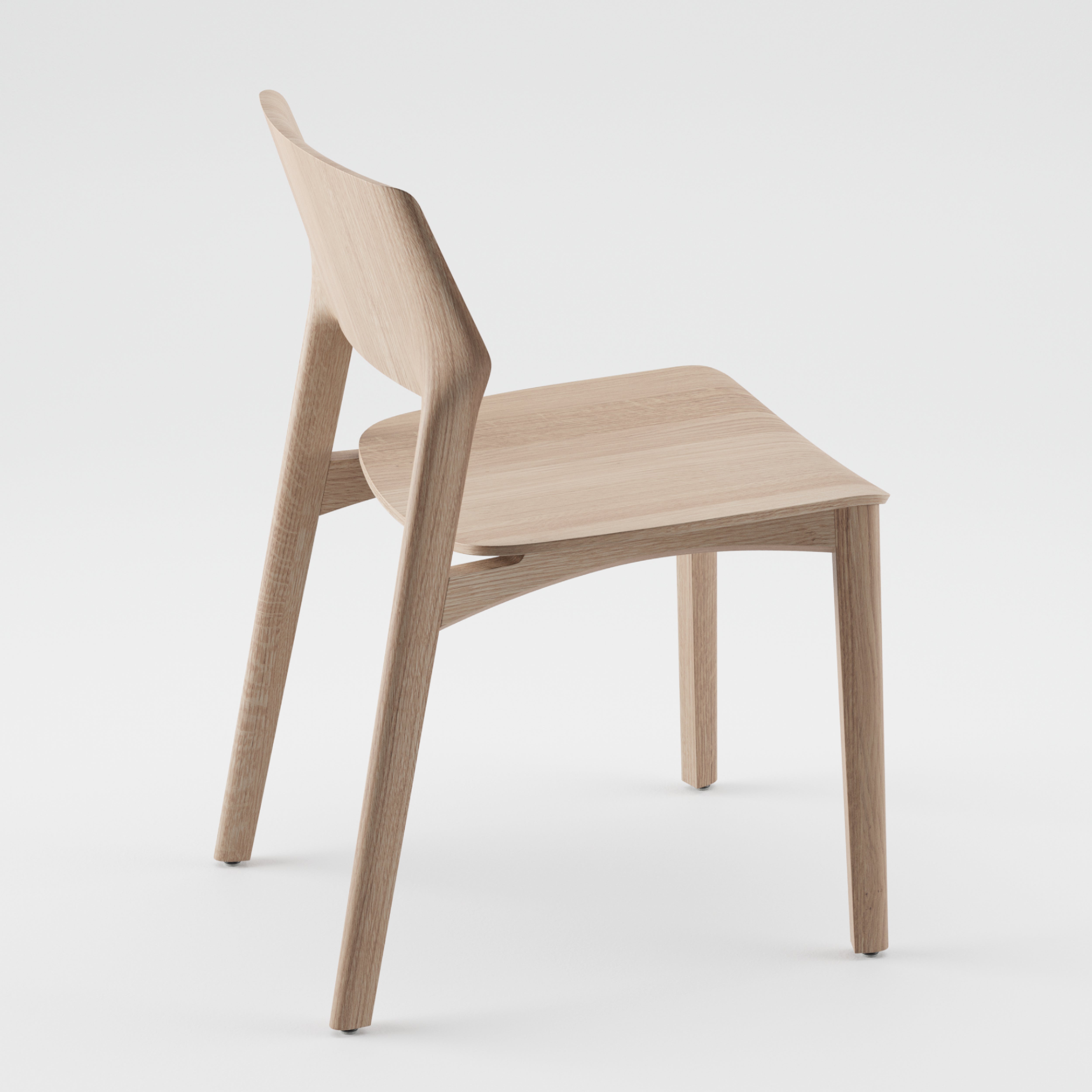 The FIN Chair by Artisan is a modern, minimalist wooden chair with an organic wood texture and smooth, light finish. Made from eco-friendly materials, it features a slightly curved backrest and seat supported by four straight legs. Shown against a plain white background.