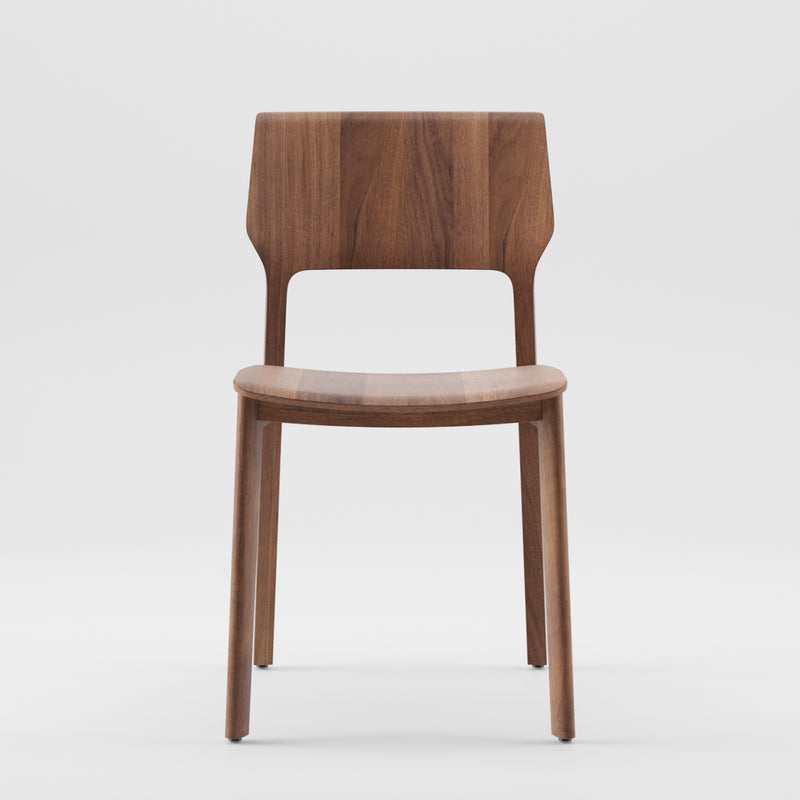 Front view of the FIN Chair by Artisan, featuring a simple design with a smooth finish and organic wood texture. It has a straight backrest, slightly curved seat, four straight legs, and is crafted from eco-friendly materials against a plain white background.