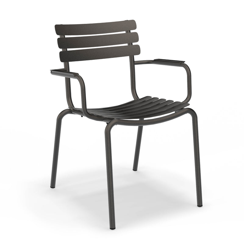 The Alua Dining Chair with Armrest by Houe features horizontal slats on the seat and backrest, armrests, four straight legs, and a dark finish. This versatile chair elegantly stands out against a plain white background.