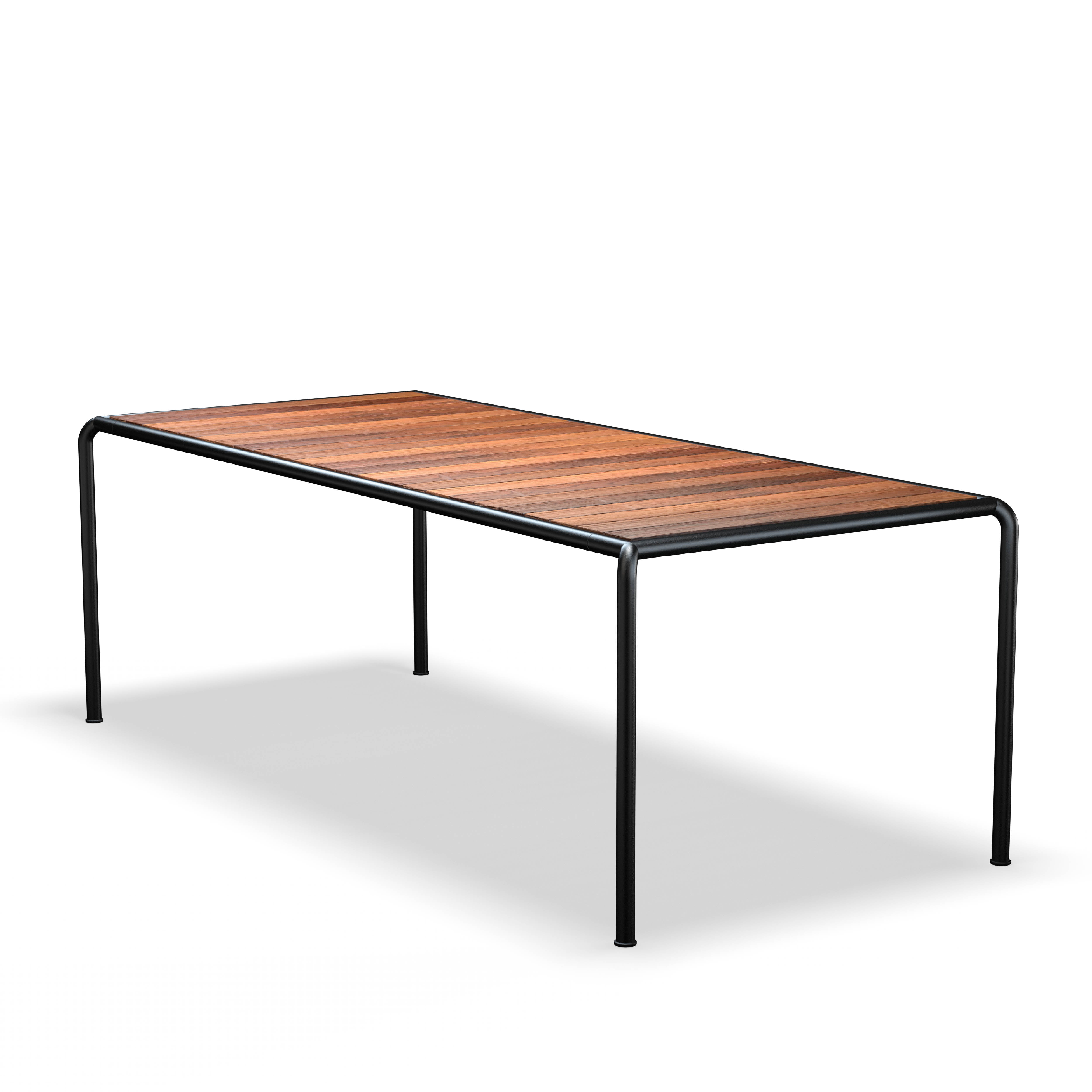 The Avanti Table by Houe boasts a rectangular wood top with sleek black metal legs, creating subtle contrast on a white backdrop. Its modular design supports easy customization through various extension sets.