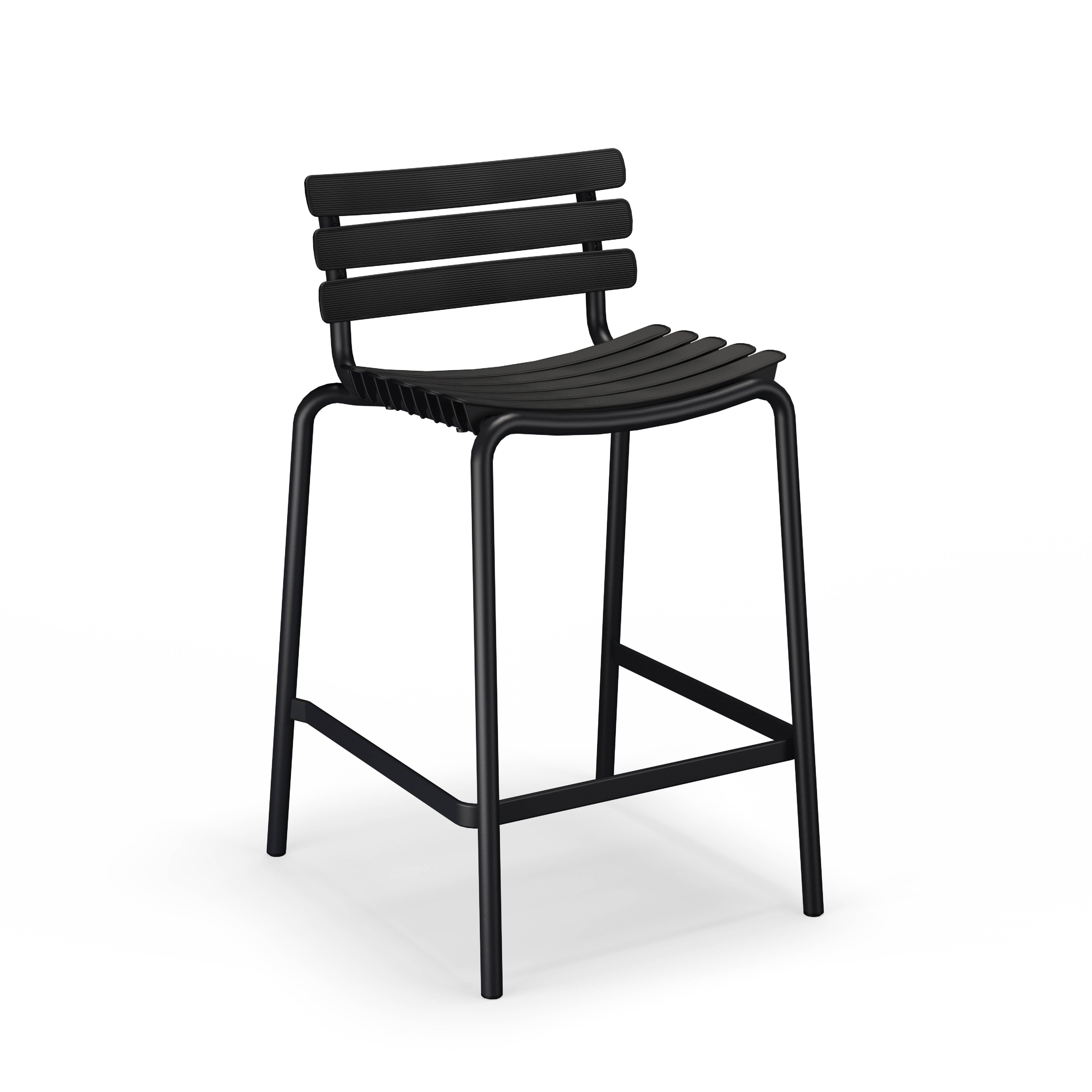 The ReClips Counter Chair by Houe is a black, minimalist bar stool featuring a sleek design with a slatted backrest, four slender legs with a square footrest, and a curved seat, all crafted from powder-coated aluminum for modern elegance.
