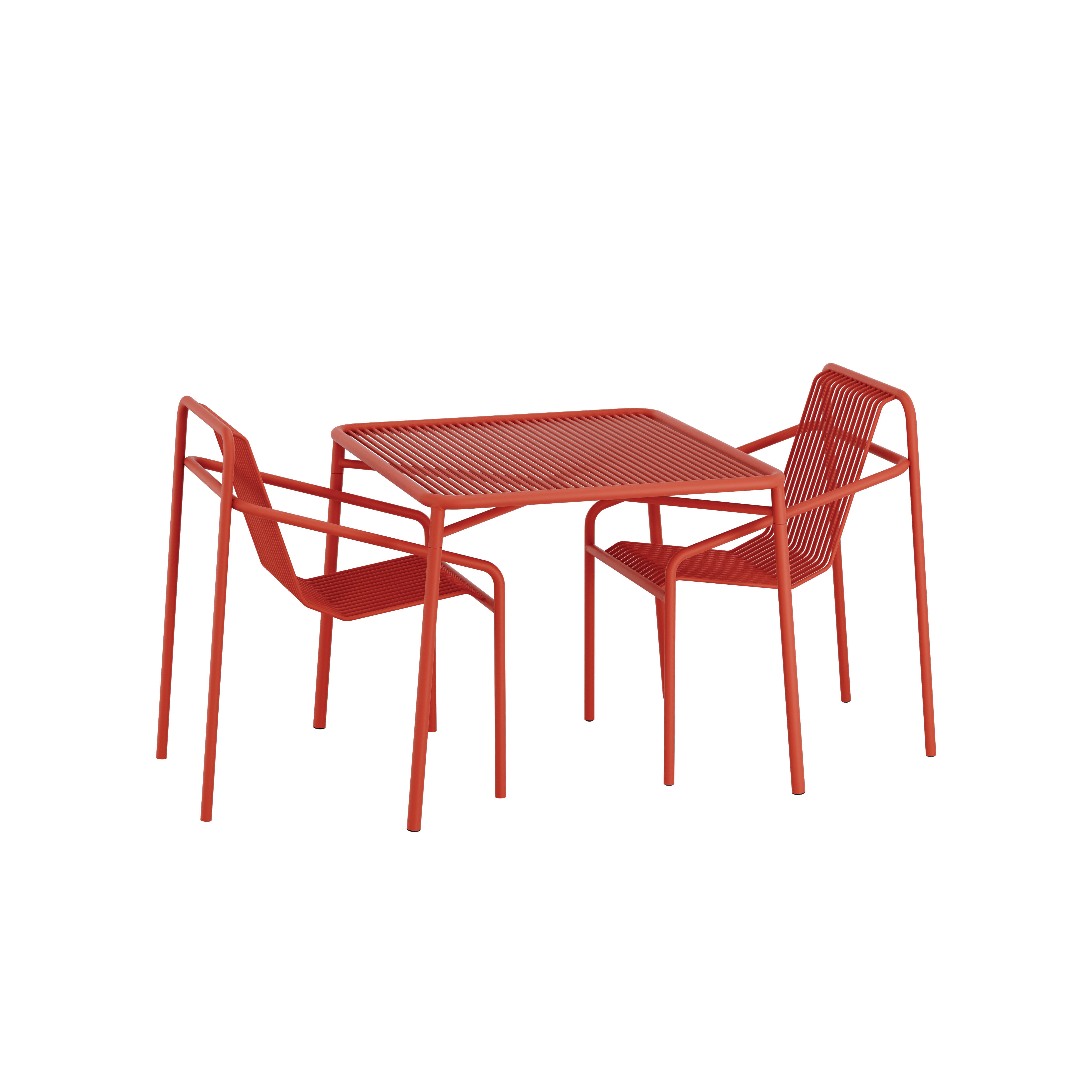 The IVY Outdoor Set by Objekte unserer Tage features a red metal table with thin slats and two matching chairs. This weather-resistant, minimalist collection is displayed against a plain white background.