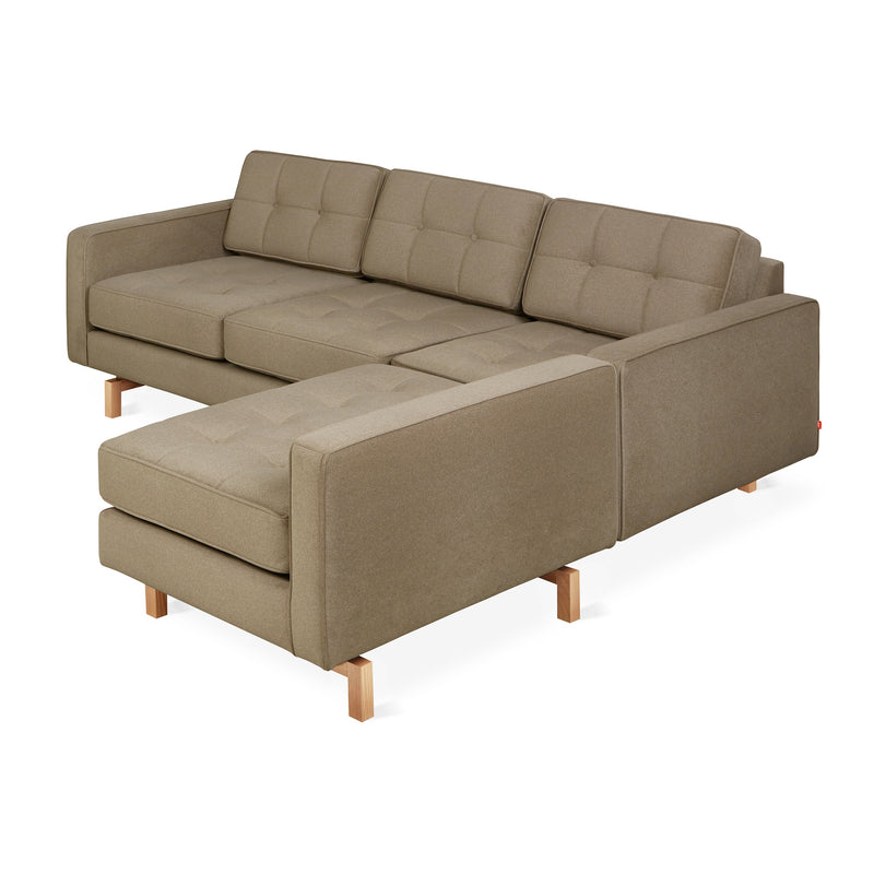 The Jane 2 LOFT Bi-Sectional by Gus Modern features a natural finish base and offers a modern, mid-century look with its stylish design—perfect against a white backdrop.
