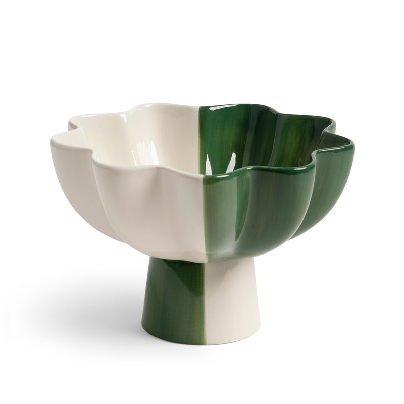 The Fruit Bowl Sun Green Small by &Klevering features a multi-color flower-like stoneware design with a glossy finish and alternating green and white sections, resting on a cylindrical pedestal base, making it an elegant and modern fruit bowl.