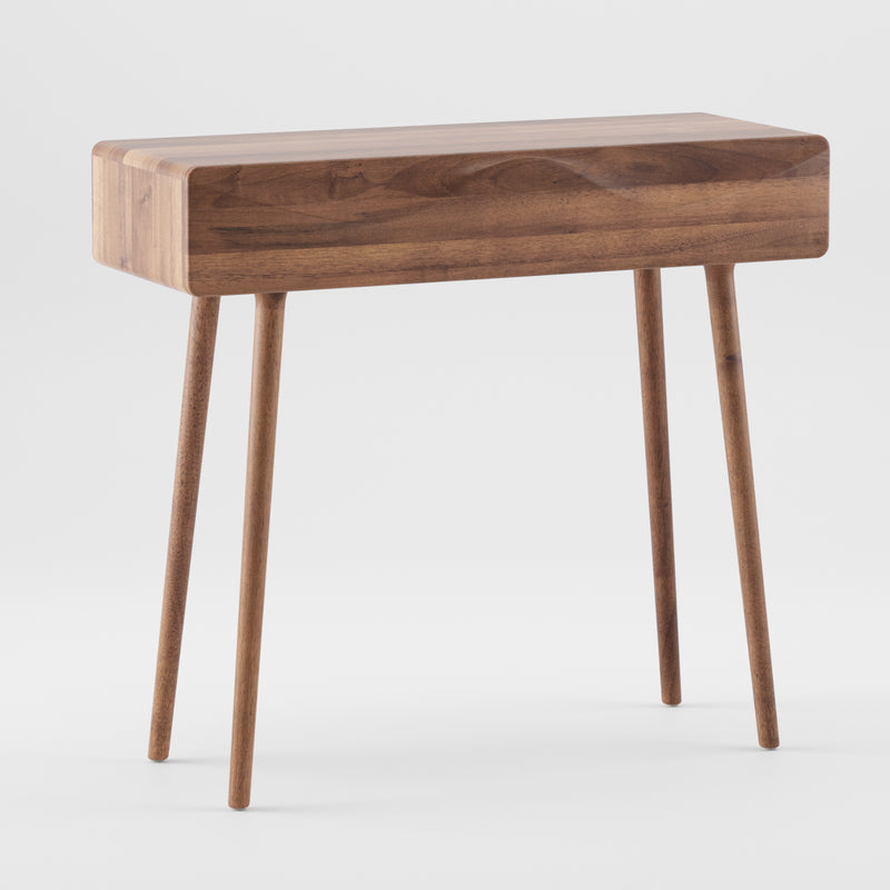 The Artisan LASTA Console Table boasts a sleek rectangular top crafted from solid wood, supported by four slender tapered legs. Finished with natural oils for an eco-friendly touch, its minimalist design stands elegantly against a plain white background.