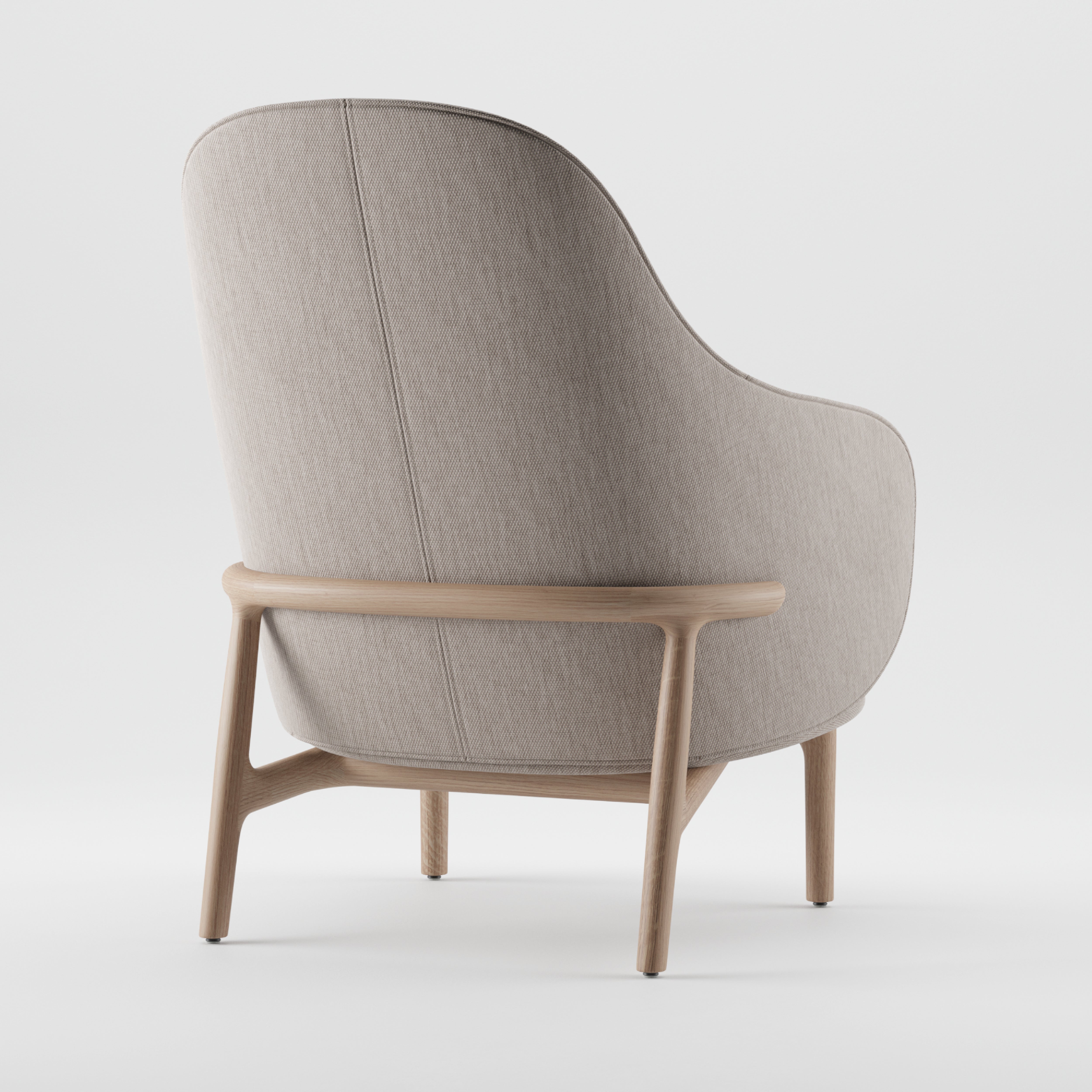 The Artisan MELA Lounge Chair High combines a high rounded backrest with light beige upholstery and a mid-century-inspired wooden structure, offering minimalist elegance. It is shown on a plain white background as part of the Mela series.