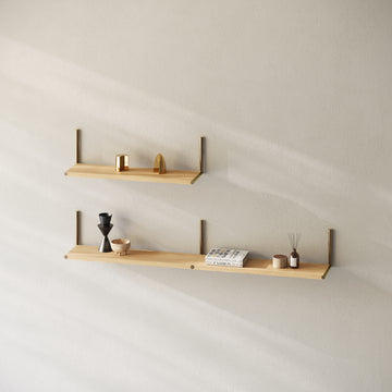 ELLE Shelf solid oak wall-mounted shelves with brass rods holding decorative items in a minimalist room setting