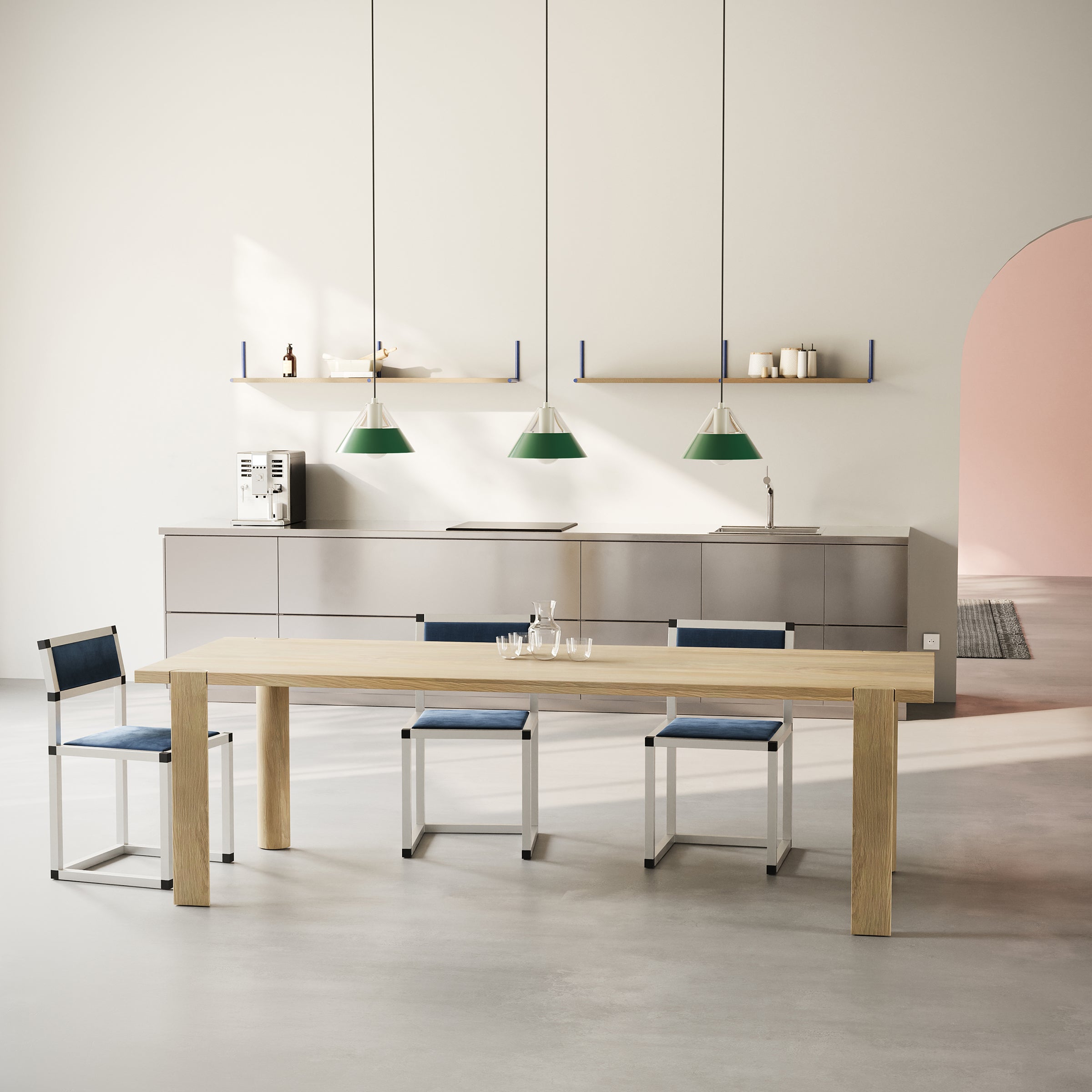 EVERYDAY Table solid wood dining table with four half-round legs and natural oak finish in modern kitchen setting.