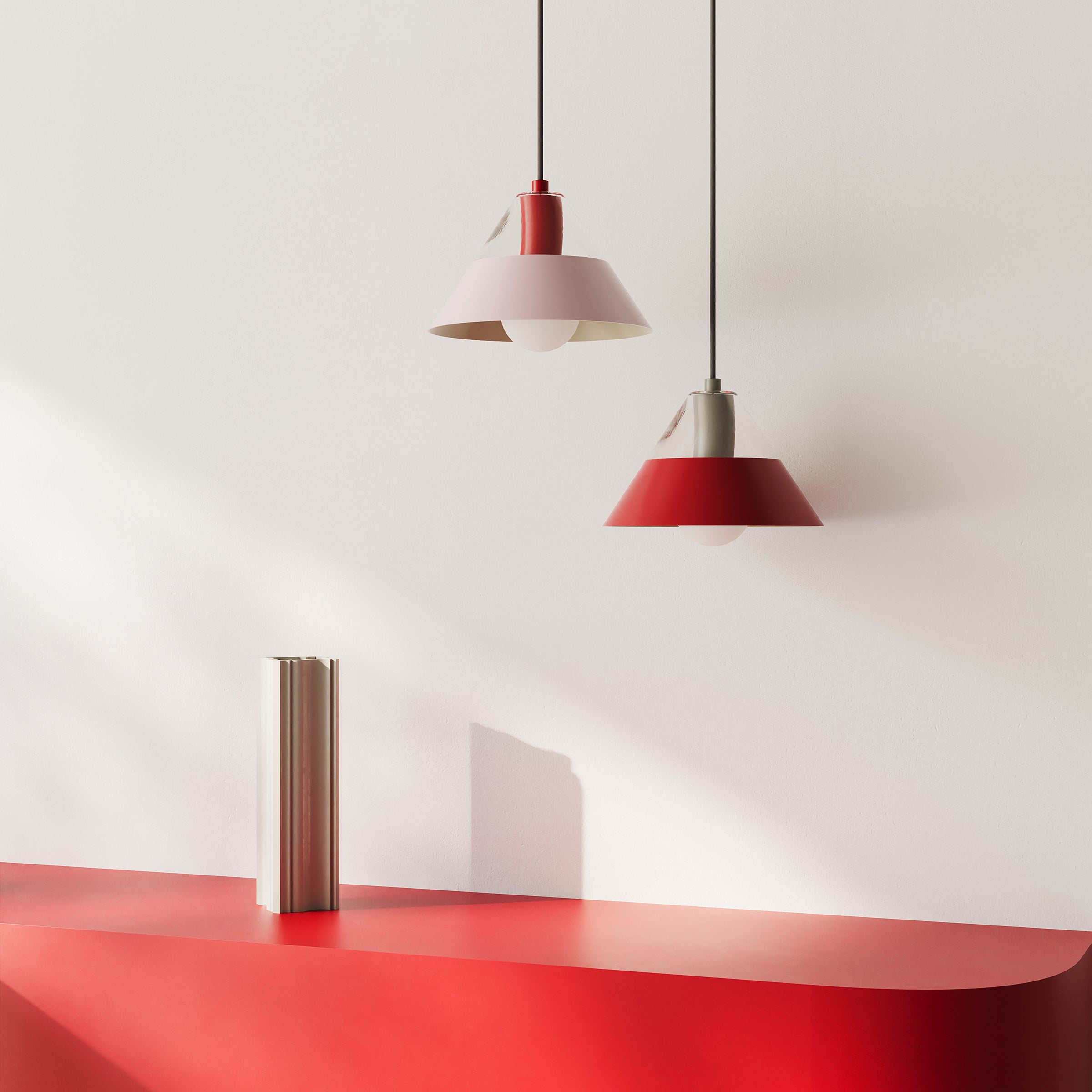 STUCCO Vase ceramic with architectural sculptural design, off-white matte, displayed on red surface under pendant lights.