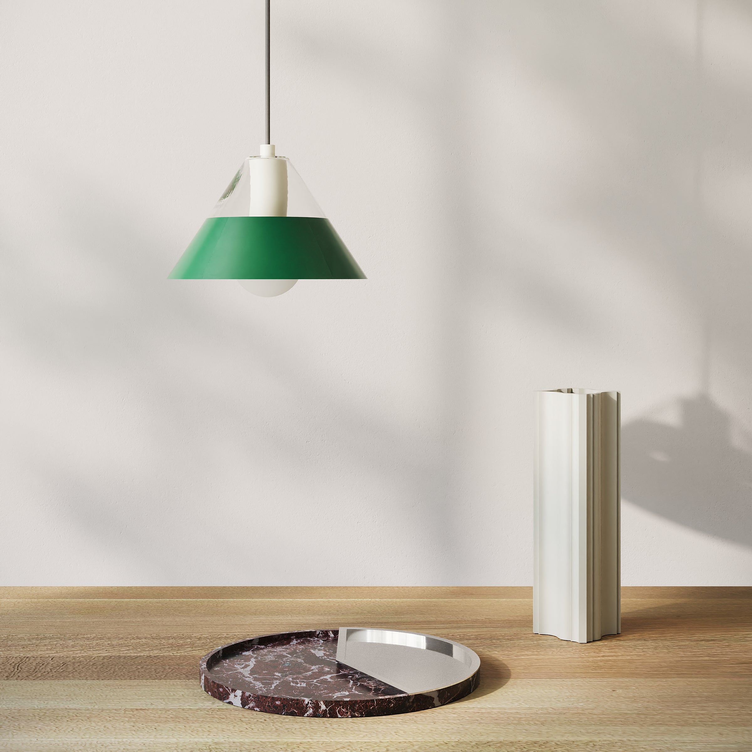 STUCCO Vase in off-white ceramic with classic architectural design displayed beside a green hanging lamp and marble tray.