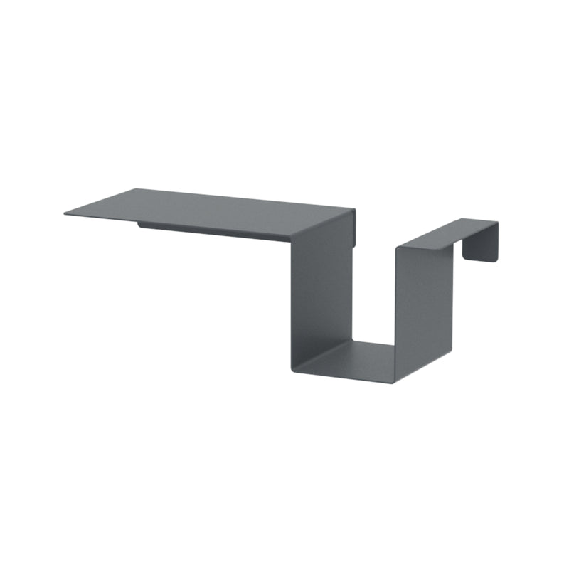A sleek, dark gray, L-shaped metal wall hook with a geometric design enhances modern interiors and pairs well with Moormanns Tagedieb bed or an adjustable mattress support.