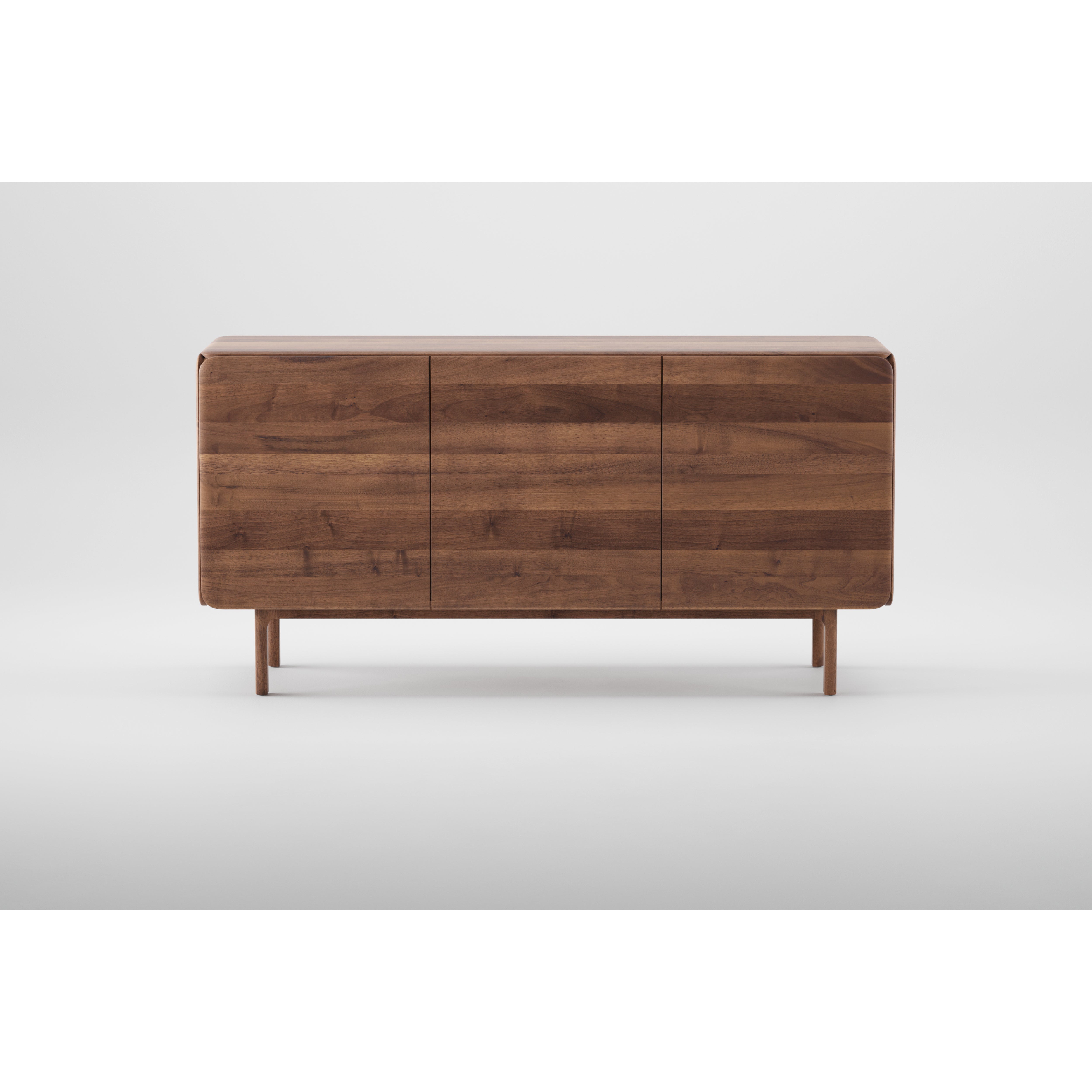 The CLOUD Sideboard by Artisan is a minimalist, sleek piece crafted from solid wood. It boasts a smooth surface with three front panels on a sturdy four-leg frame. Its rich, warm finish is achieved using natural oils, highlighting its environmentally-friendly materials.