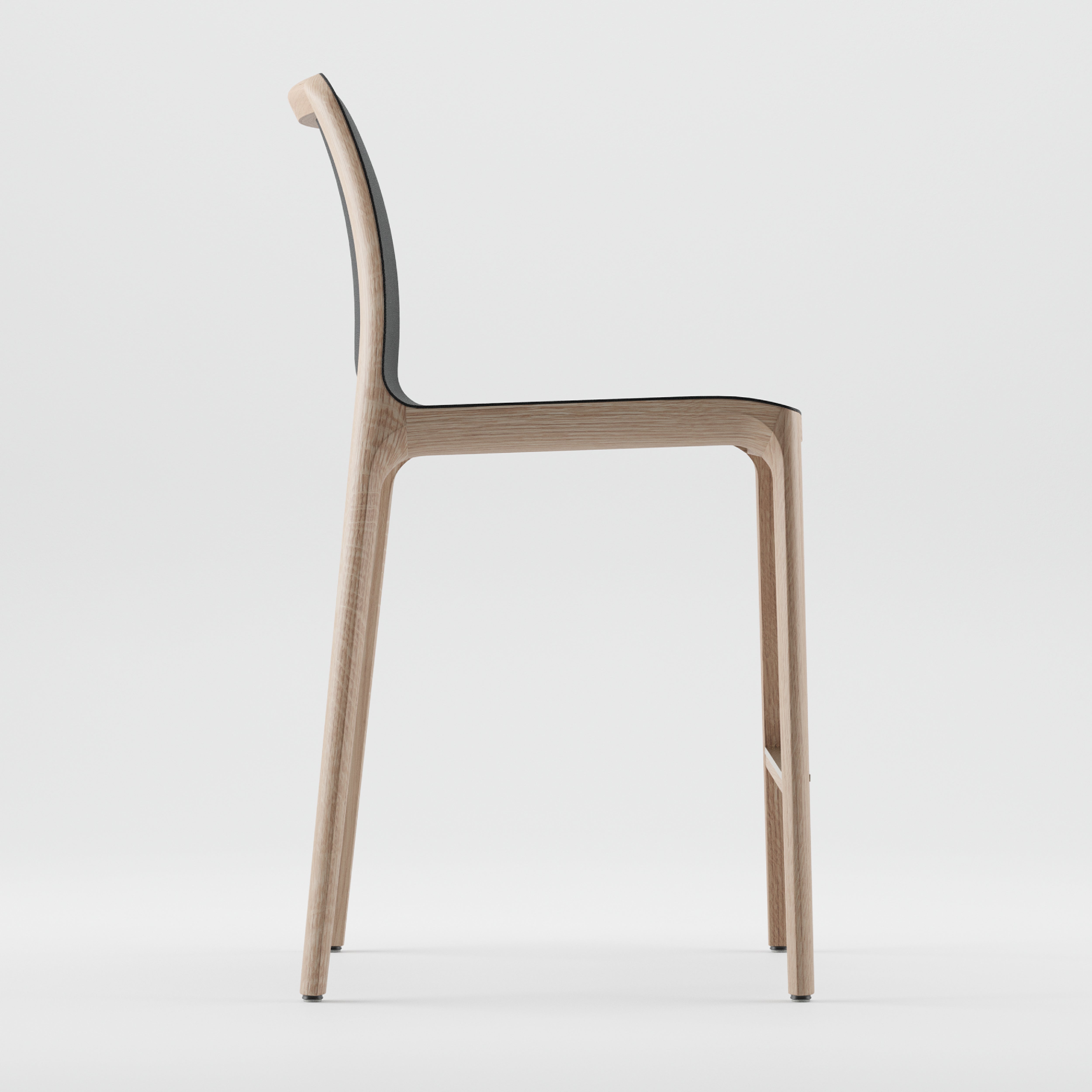 Side view of the minimalist INVITO Barstool by Artisan, featuring a modern design with solid wood construction, a curved backrest, and slender legs on a white background.