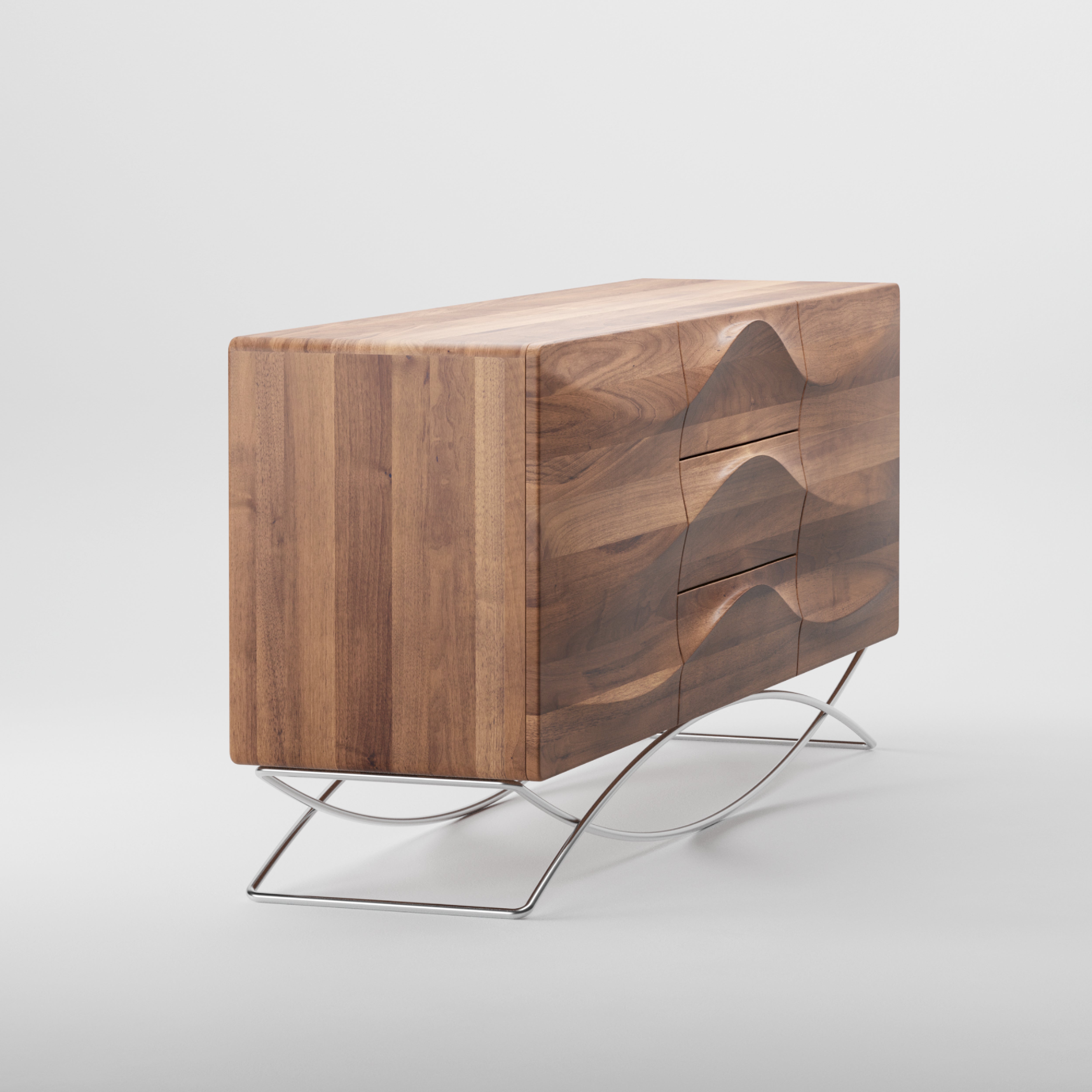 The Artisan LASTA Sideboard showcases a modern wave-like design crafted from solid wood with a natural oil finish. It features three drawers and stands on sleek, curved metal legs, offering a contemporary and artistic look against a plain white backdrop.
