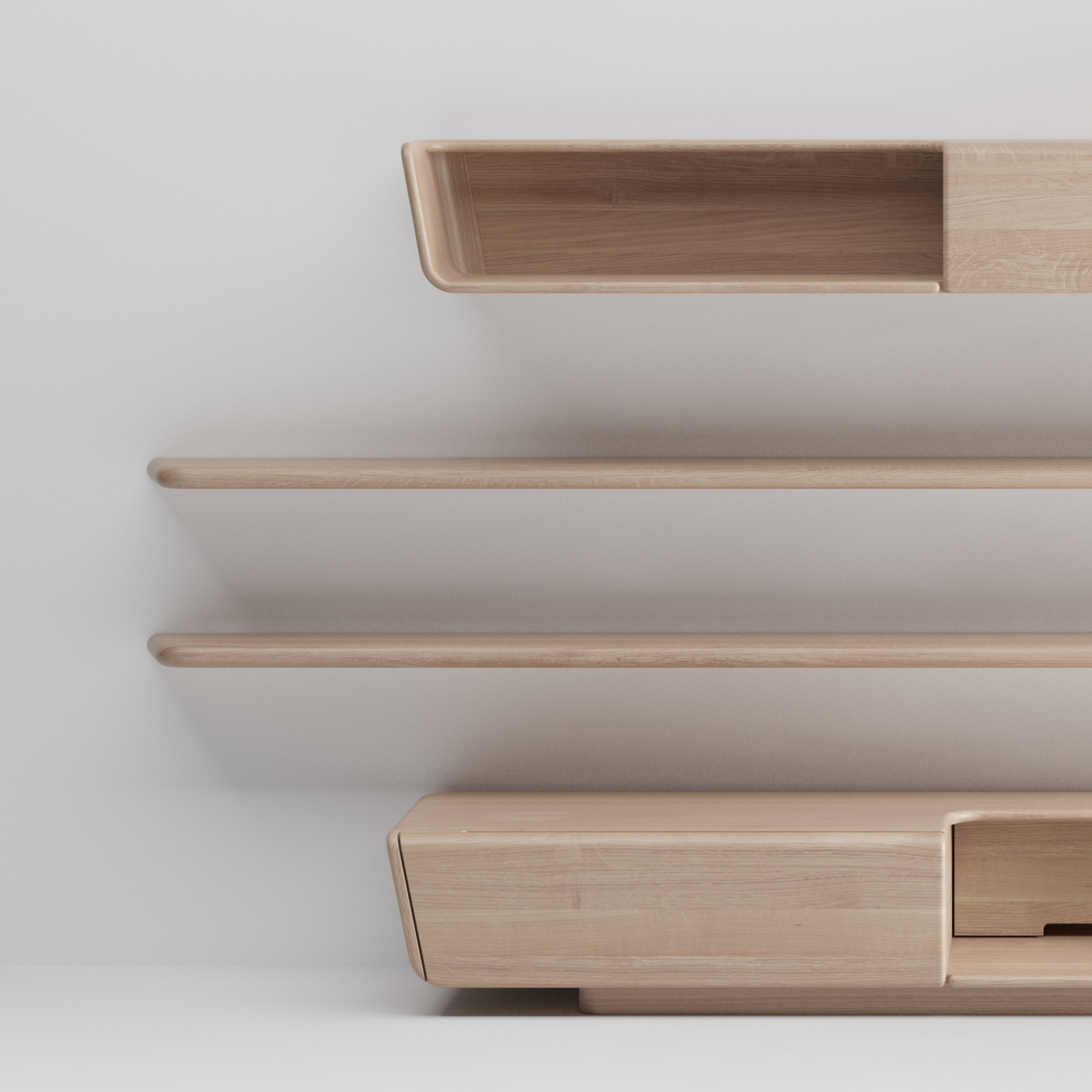 The Artisan LATUS Modular System offers minimalist wooden shelves and a cabinet set against a light wall. Designed with smooth lines and natural wood textures, it provides a modern, elegant look using environmentally-friendly materials.